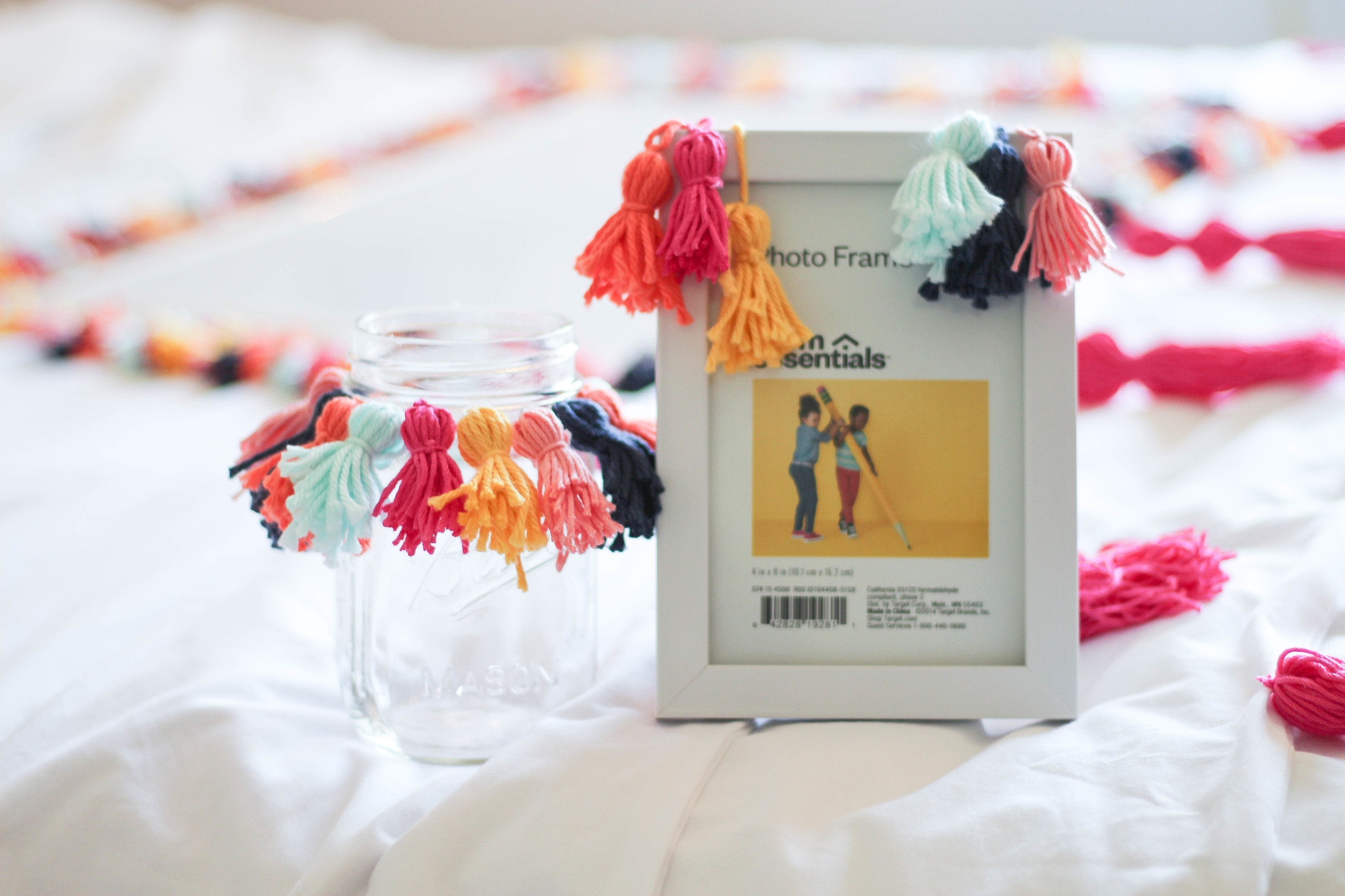 DIY Tassel picture frame and crafts Tassel decor for dorm room by lauren lindmark on daily dose of charm