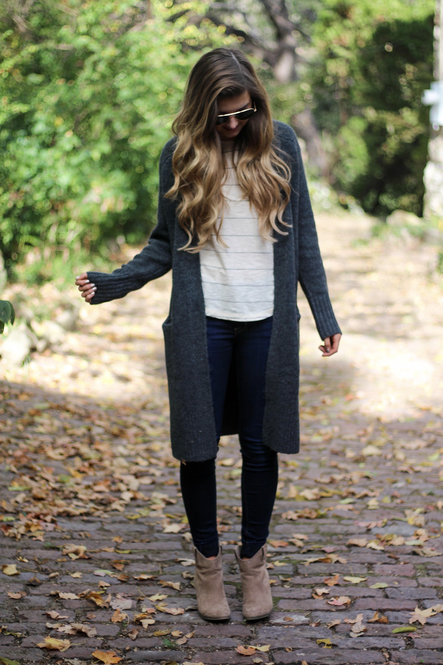 Long cardigan with striped shirt cute and simple outfit for fall! Perfectly paired with booties. The perfect fall or winter outfit by Lauren Lindmark on Daily Dose of Charm dailydoseofcharm.com