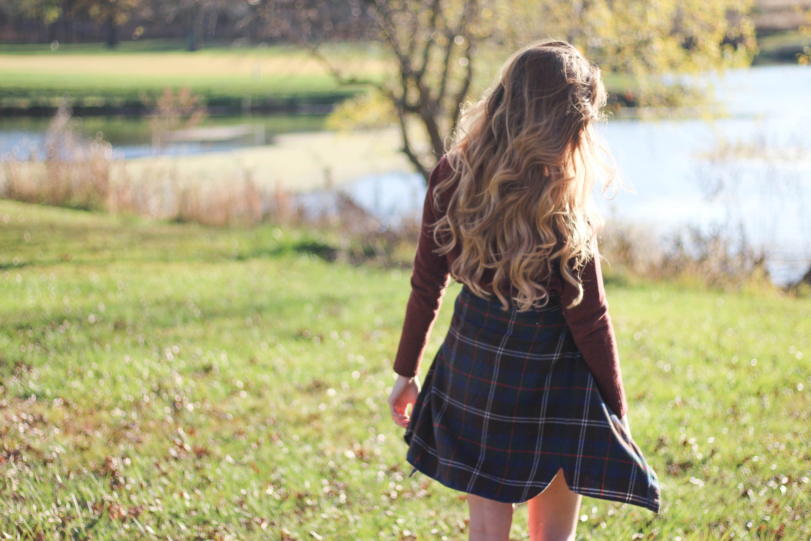 The perfect fall outfit! The corduroy skirt is showing up everywhere so I decided to pair it with a flannel to be a bit different. Of course I added a burgundy sweater because it's my favorite color for fall! As for my boyfriend, he's rocking a JORD wooden watch that I am in love with! Cute couple pictures are my favorite, check out our poses for engagement photo ideas and more! By Lauren Lindmark on Daily Dose of Charm dailydoseofcharm.com