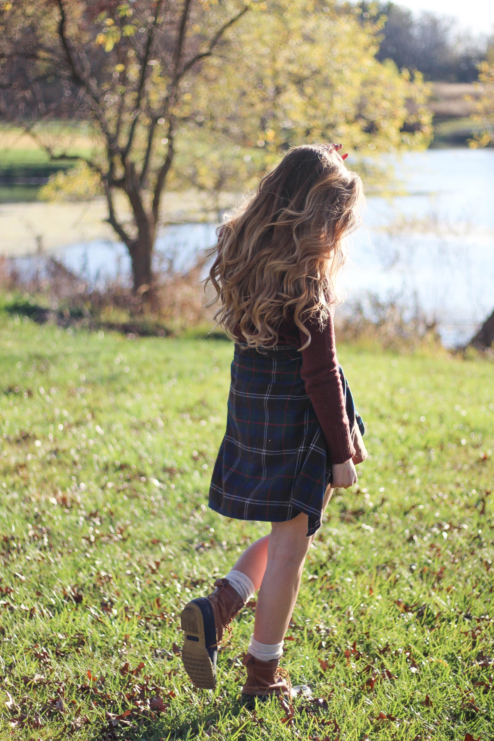 The perfect fall outfit! The corduroy skirt is showing up everywhere so I decided to pair it with a flannel to be a bit different. Of course I added a burgundy sweater because it's my favorite color for fall! As for my boyfriend, he's rocking a JORD wooden watch that I am in love with! Cute couple pictures are my favorite, check out our poses for engagement photo ideas and more! By Lauren Lindmark on Daily Dose of Charm dailydoseofcharm.com