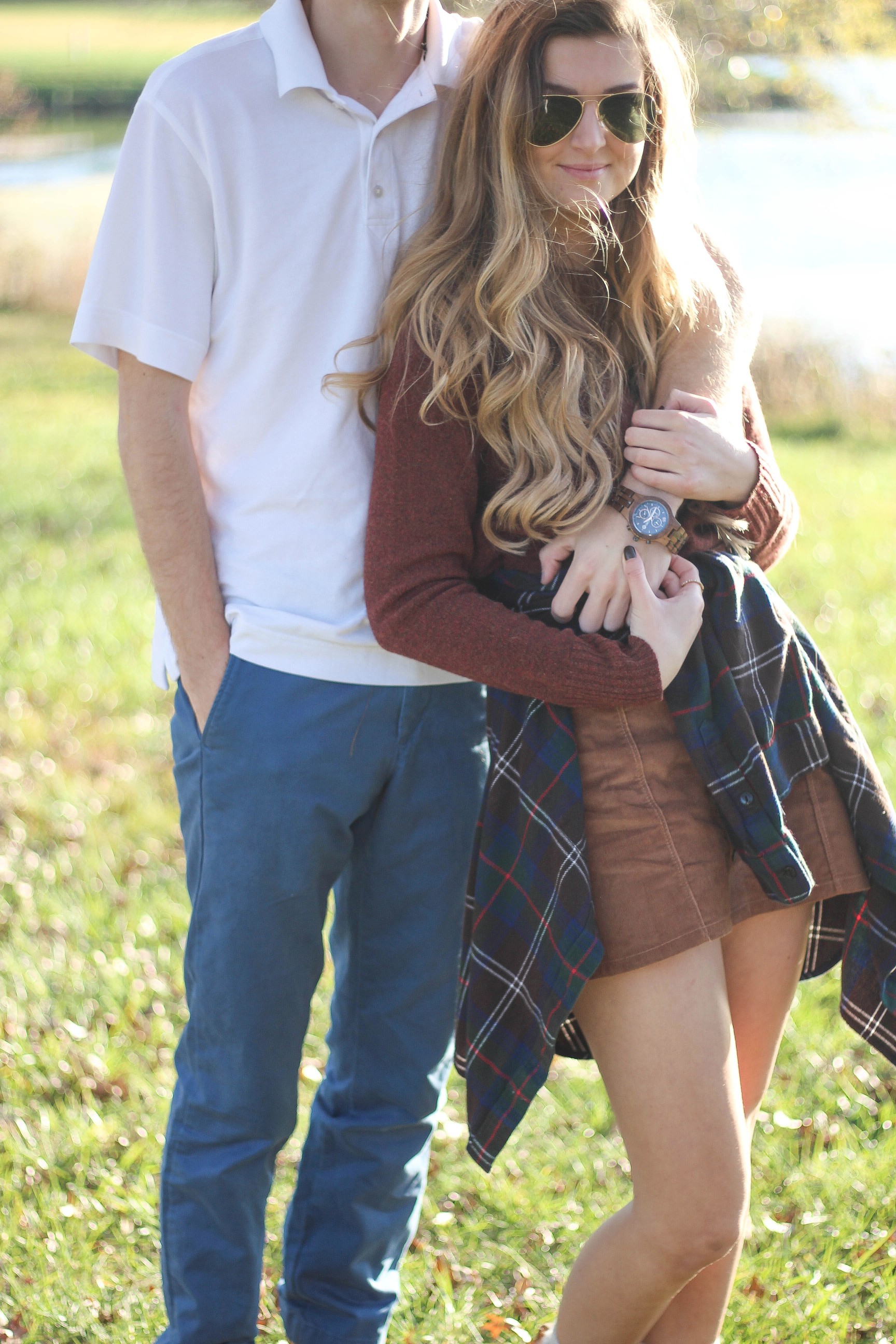 The perfect fall outfit! The corduroy skirt is showing up everywhere so I decided to pair it with a flannel to be a bit different. Of course I added a burgundy sweater because it's my favorite color for fall! As for my boyfriend, he's rocking a JORD wooden watch that I am in love with! Cute couple pictures are my favorite, check out our poses for engagement photo ideas and more! By Lauren Lindmark on Daily Dose of Charm dailydoseofcharm.com