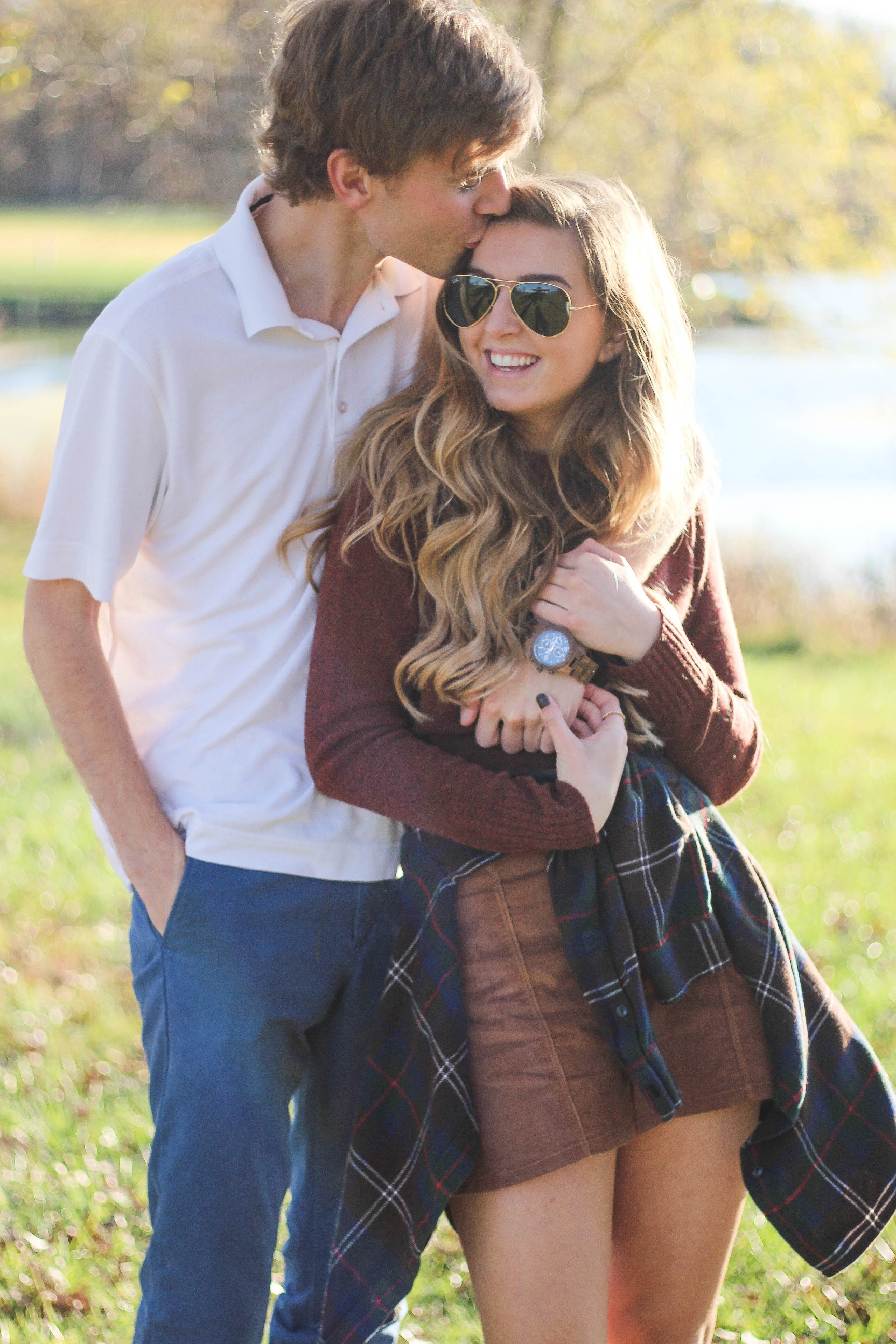 The perfect fall outfit! The corduroy skirt is showing up everywhere so I decided to pair it with a flannel to be a bit different. Of course I added a burgundy sweater because it's my favorite color for fall! As for my boyfriend, he's rocking a JORD wooden watch that I am in love with! Cute couple pictures are my favorite, check out our poses for engagement photo ideas and more! By Lauren Lindmark on Daily Dose of Charm dailydoseofcharm.com