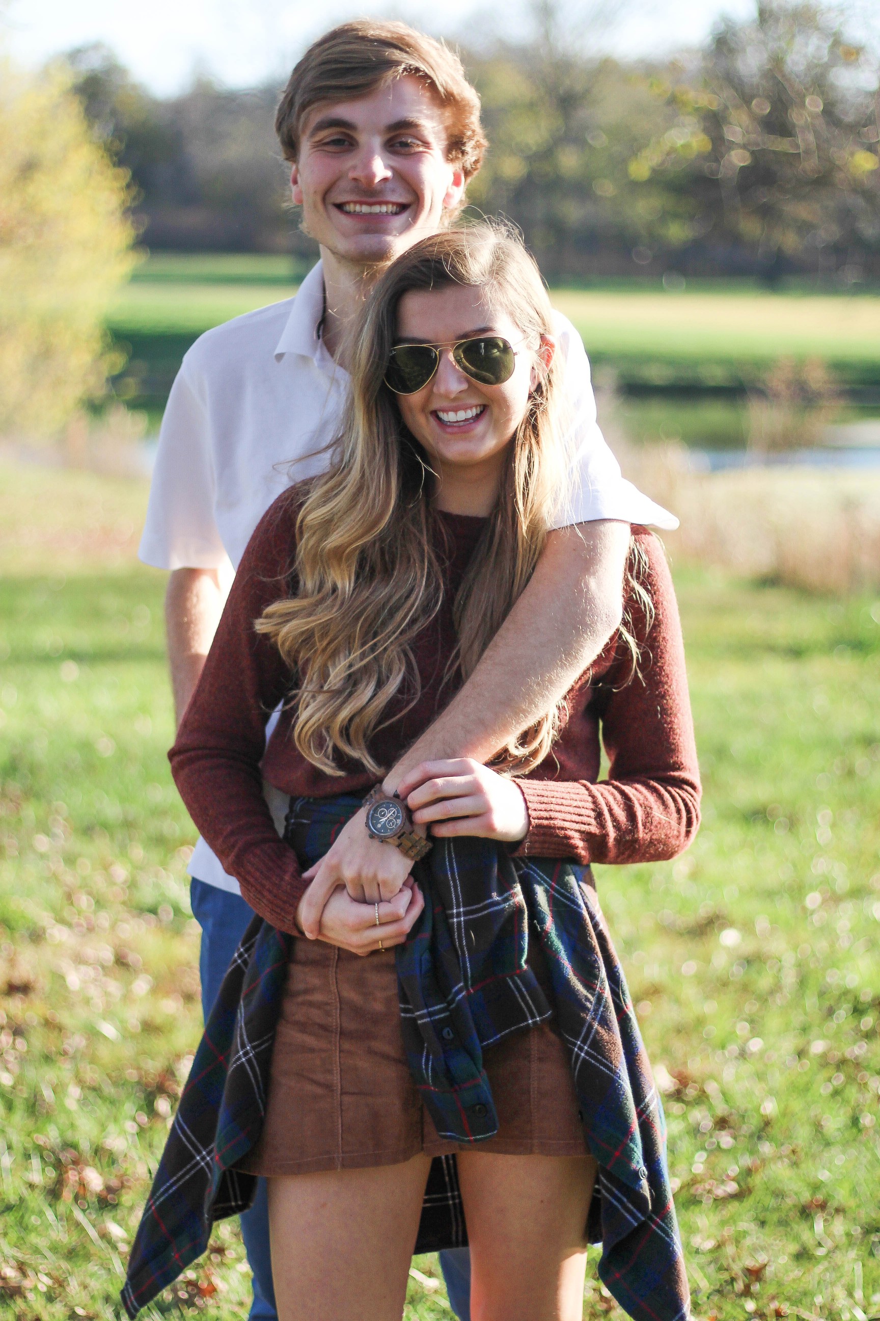 The perfect fall outfit! The corduroy skirt is showing up everywhere so I decided to pair it with a flannel to be a bit different. Of course I added a burgundy sweater because it's my favorite color for fall! As for my boyfriend, he's rocking a JORD wooden watch that I am in love with! Cute couple pictures are my favorite, check out our poses for engagement photo ideas and more! By Lauren Lindmark on Daily Dose of Charm dailydoseofcharm.com