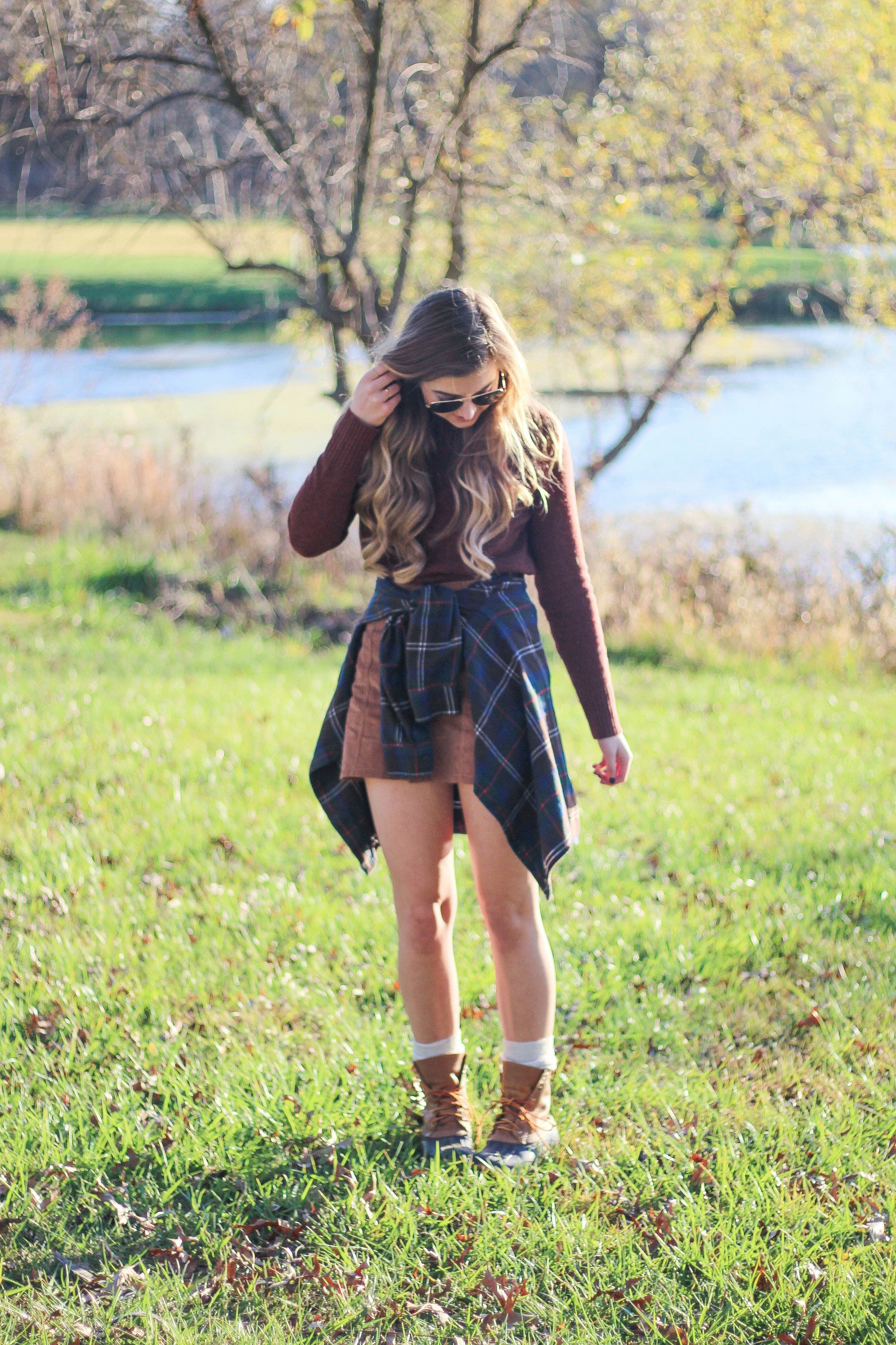 The perfect fall outfit! The corduroy skirt is showing up everywhere so I decided to pair it with a flannel to be a bit different. Of course I added a burgundy sweater because it's my favorite color for fall! As for my boyfriend, he's rocking a JORD wooden watch that I am in love with! Cute couple pictures are my favorite, check out our poses for engagement photo ideas and more! By Lauren Lindmark on Daily Dose of Charm dailydoseofcharm.com