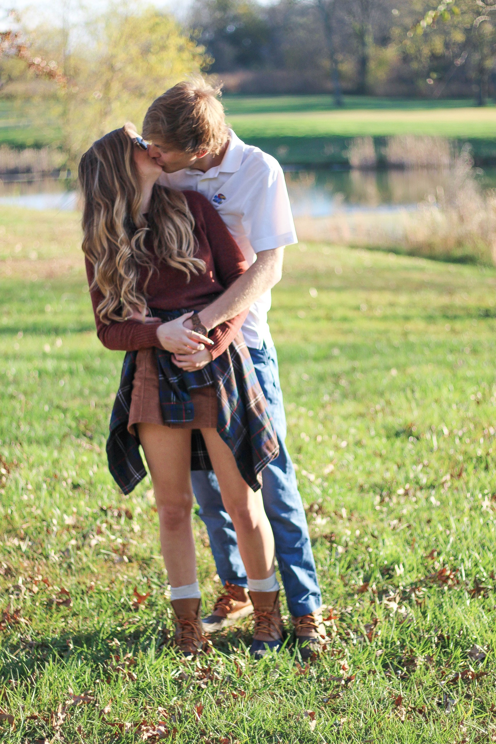 The perfect fall outfit! The corduroy skirt is showing up everywhere so I decided to pair it with a flannel to be a bit different. Of course I added a burgundy sweater because it's my favorite color for fall! As for my boyfriend, he's rocking a JORD wooden watch that I am in love with! Cute couple pictures are my favorite, check out our poses for engagement photo ideas and more! By Lauren Lindmark on Daily Dose of Charm dailydoseofcharm.com