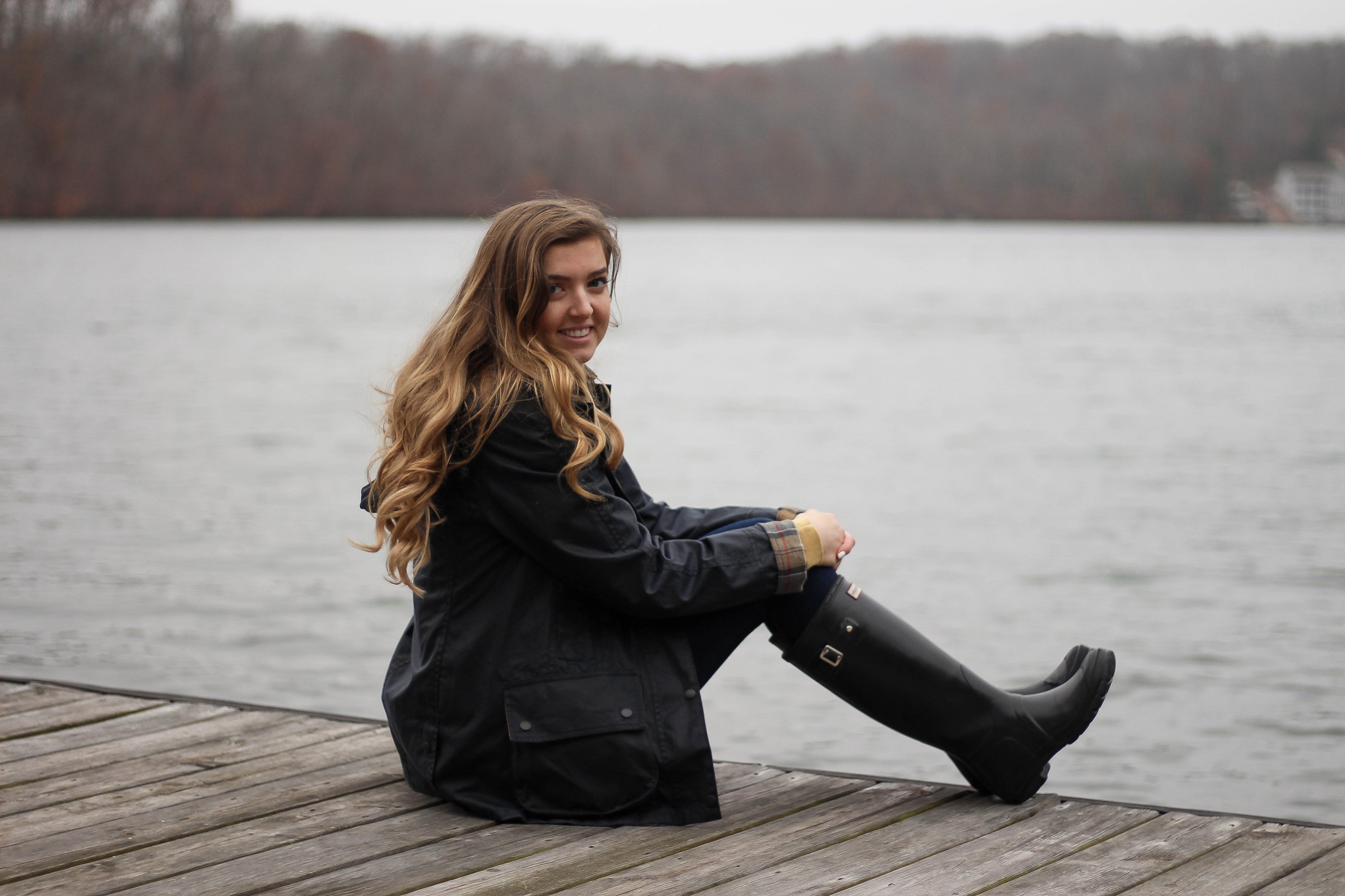 Perfect fall outfit including a Barbour coat, United tee fall t-shirt, and black hunter boots. If you want to know how to style hunter boots this is it! Check it out on my fashion blog daily dose of charm by Lauren Lindmark dailydoseofcharm.com