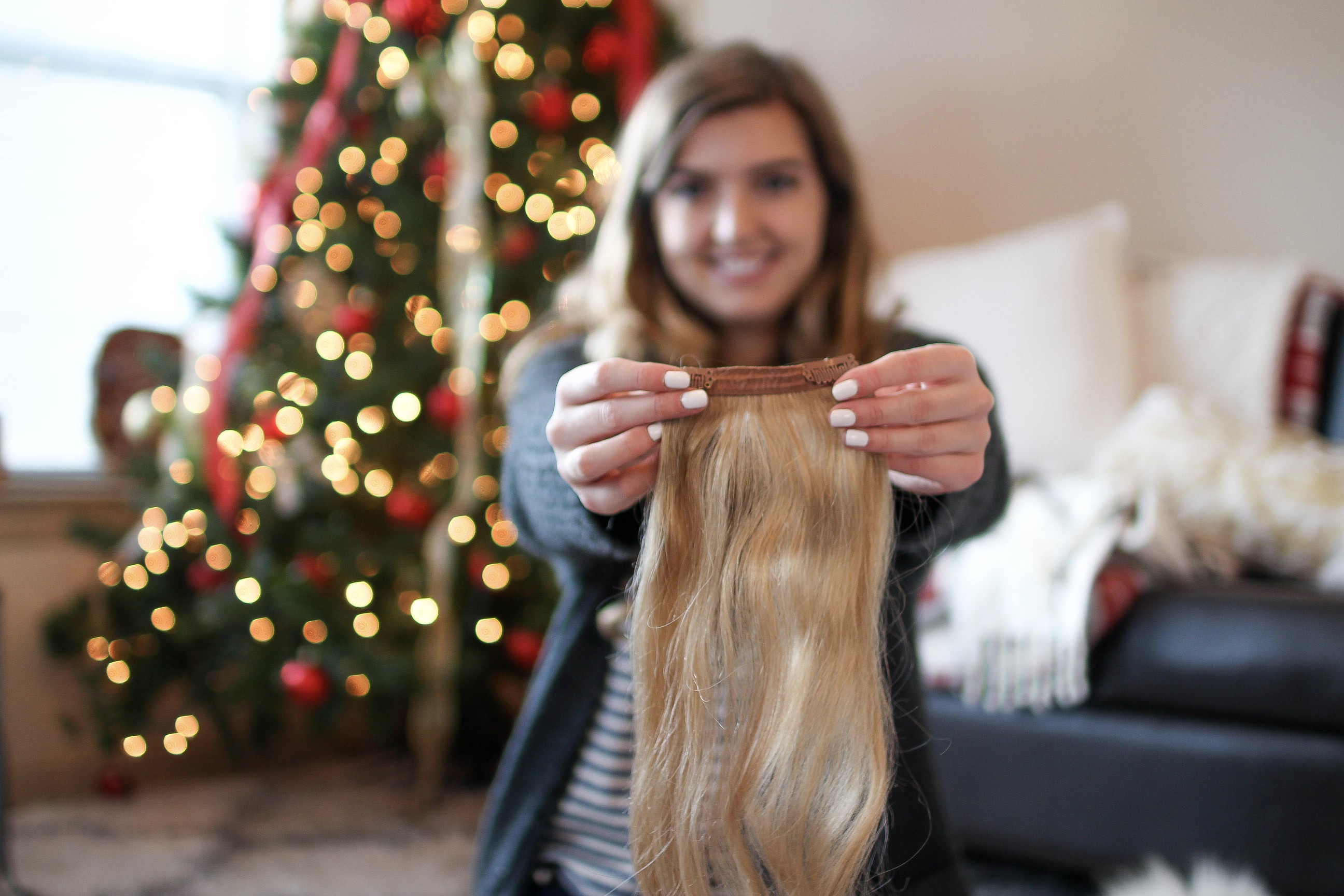 How I curl my hair and how I curl my hair with hair extensions. Also a Luxy Hair review PLUS discount code! Curly hair by Lauren Lindmark on dailydoseofcharm.com