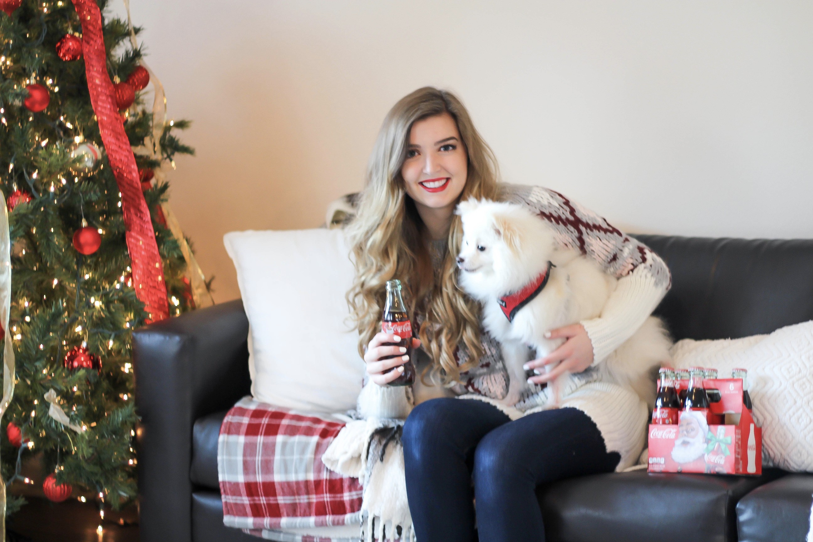 SLEIGH YOUR LOOK! Adorable oversized sweater with fun colors and pattern. Super cozy winter outfit. Pomeranian puppy, white Pomeranian, miniature Pomeranian, toy Pomeranian, red lips and curled hair by Lauren Lindmark dailydoseofcharm.com daily dose of charm