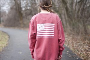 Casual outfits are perfect for chilly days. I love this United Tees American flag sweatshirt! It's so cozy because it's Comfort Colors. I paired it with some Target running leggings and Adidas sneakers! By Lauren Lindmark on dailydoseofcharm.com daily dose of charm