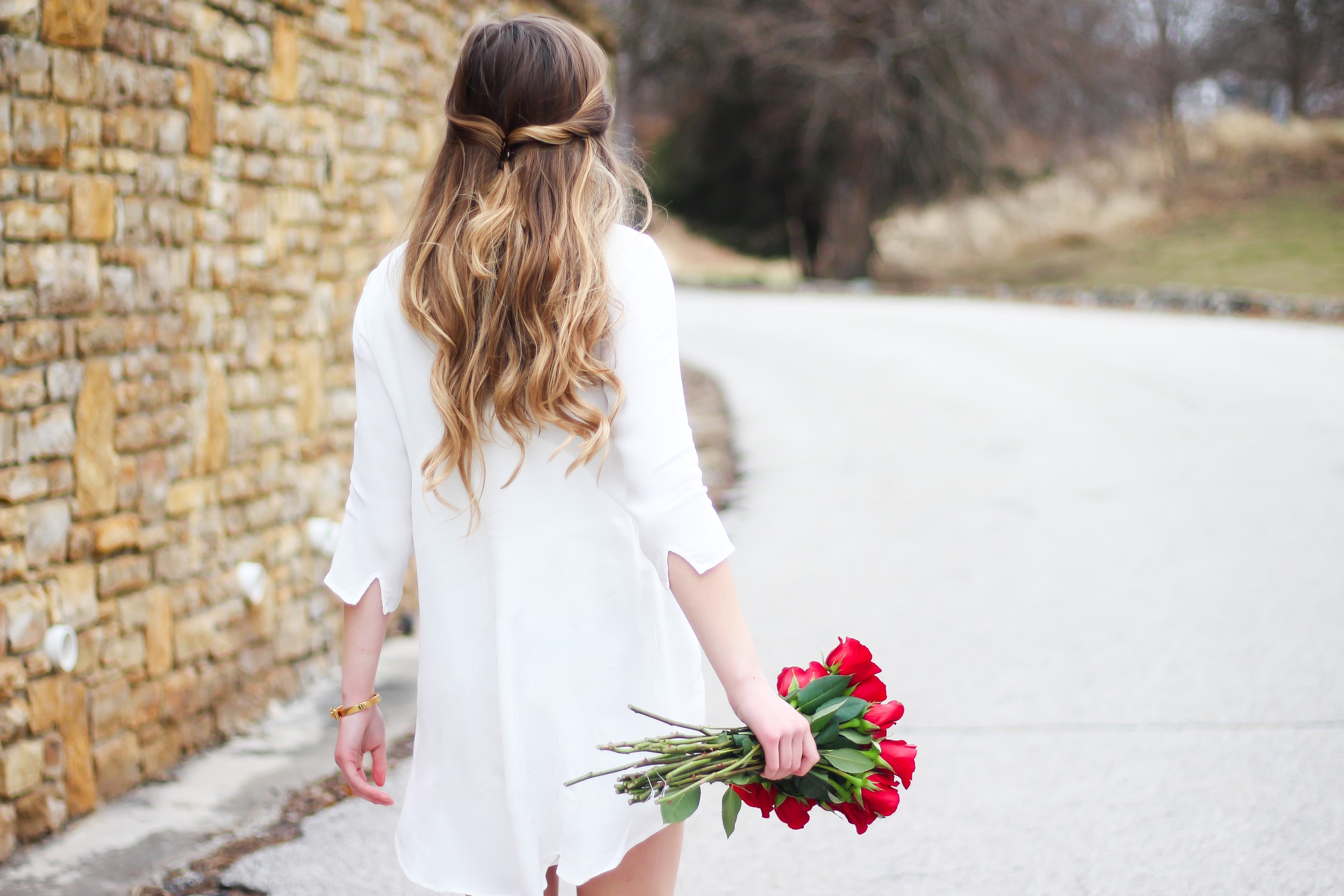 Perfect Valentine's Day look! If you need to know what to wear for Valentines Day look no further! Love this white deep vneck lace dress, especially with hunter green booties! I paired it with white Kendra Scott earrings and my ray ban aviators! By Lauren Lindmark daily dose of charm on dailydoseofcharm.com 