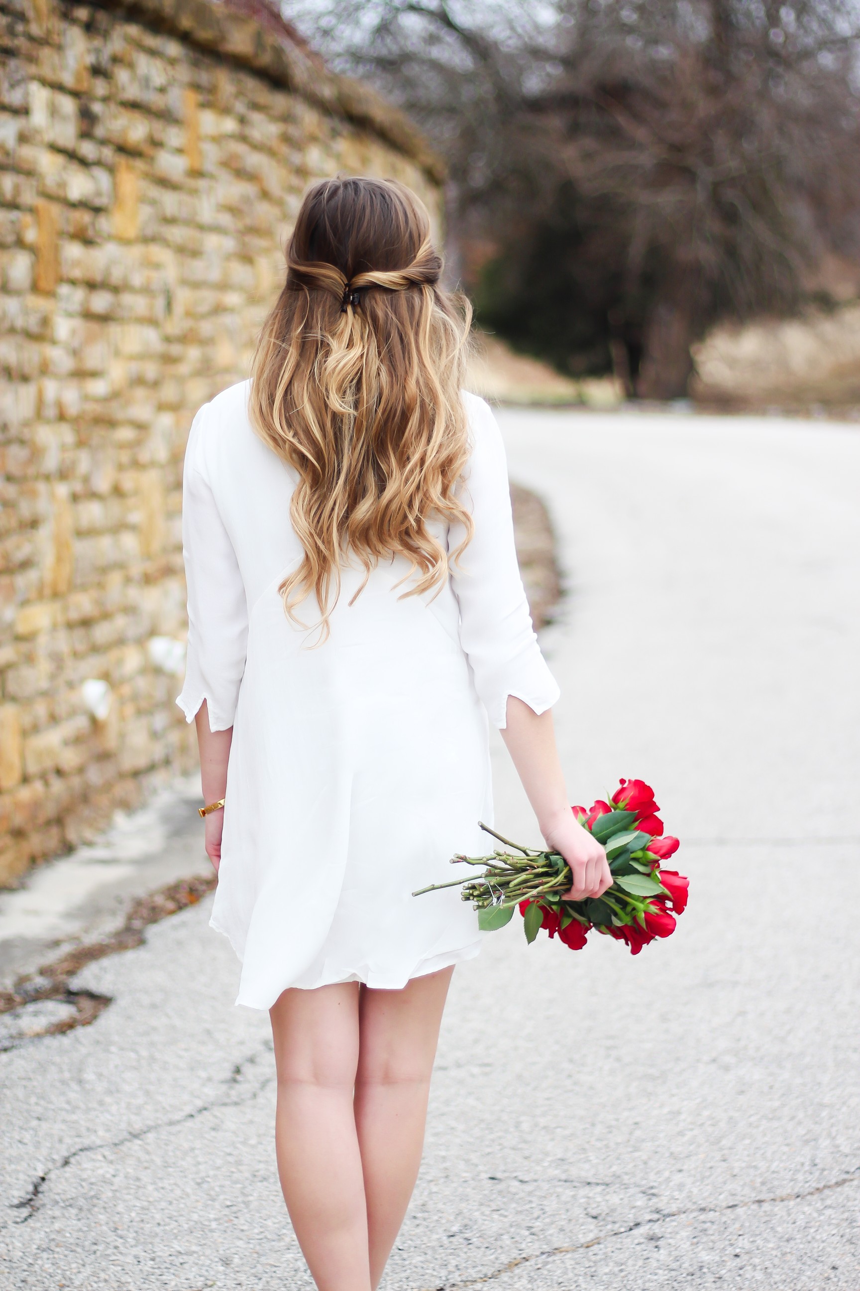 Perfect Valentine's Day look! If you need to know what to wear for Valentines Day look no further! Love this white deep vneck lace dress, especially with hunter green booties! I paired it with white Kendra Scott earrings and my ray ban aviators! By Lauren Lindmark daily dose of charm on dailydoseofcharm.com 