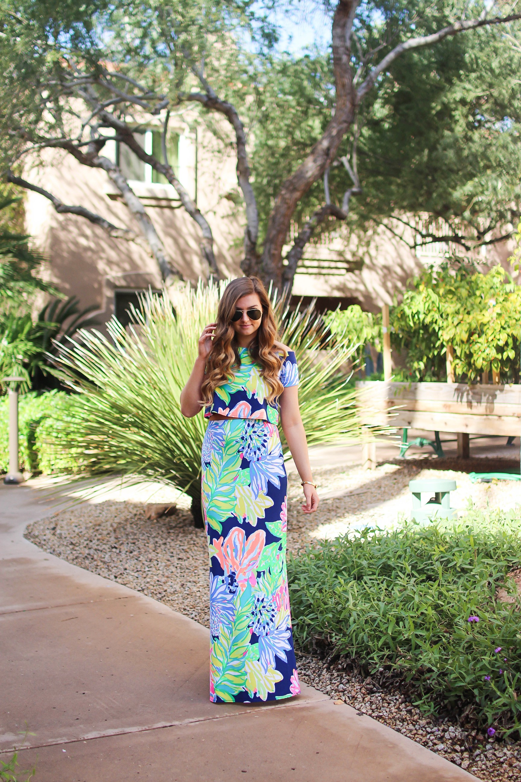 Lilly Pulitzer two piece maxi dress in Navy Travelers Palm. I love everything in the Resort Wear 365 collection this year! I paired this maxi dress with my favorite wedges and gold bangle! By Lauren Lindmark on dailydoseofcharm.com daily dose of charm