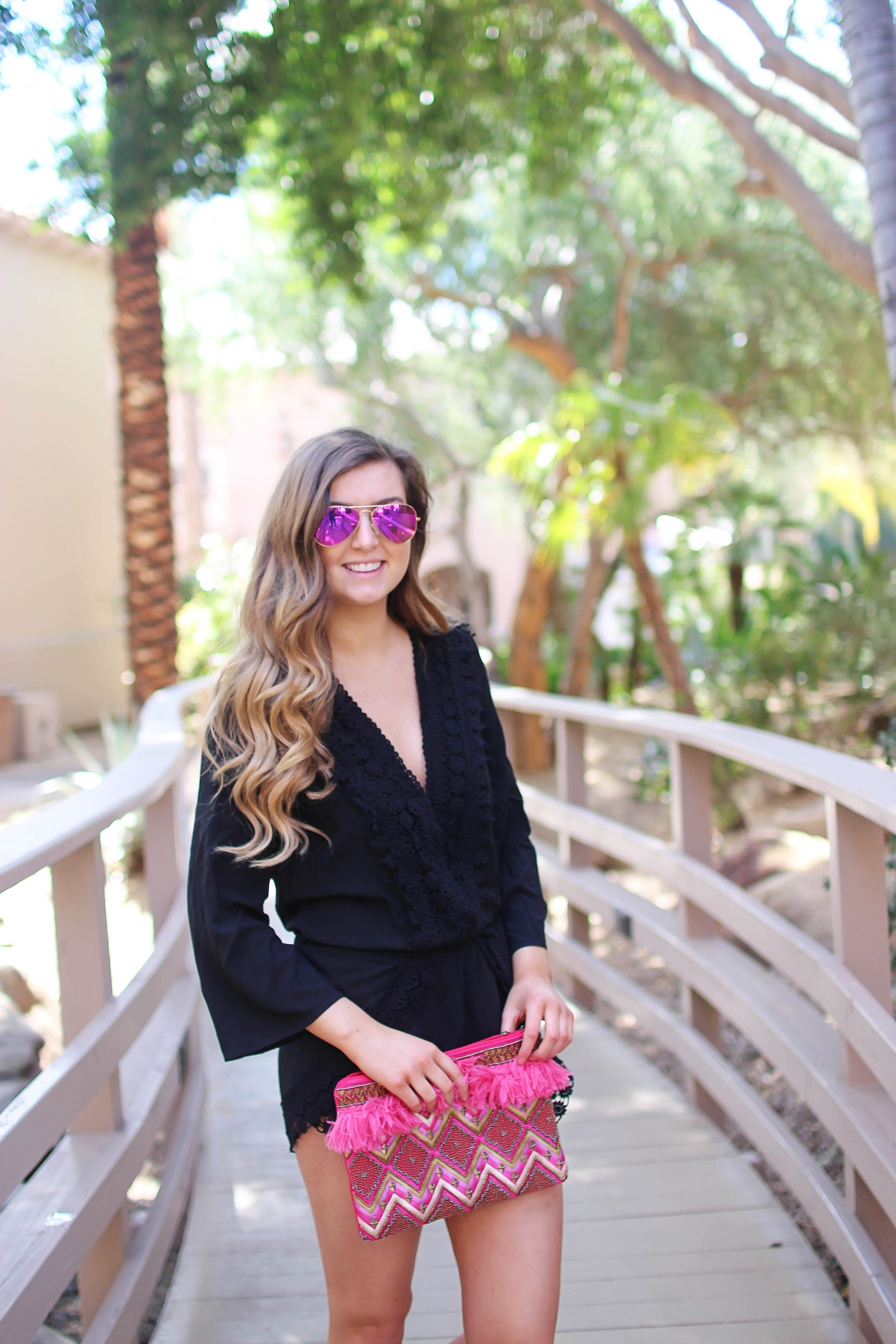 Black romper cover up perfect for spring break and this summer! I love the resort wear trend, so I paired this with a Moroccan style clutch and cute tassel shoes by Sam Edelman. By Lauren Lindmark on Daily Dose of Charm dailydoseofcharm.com