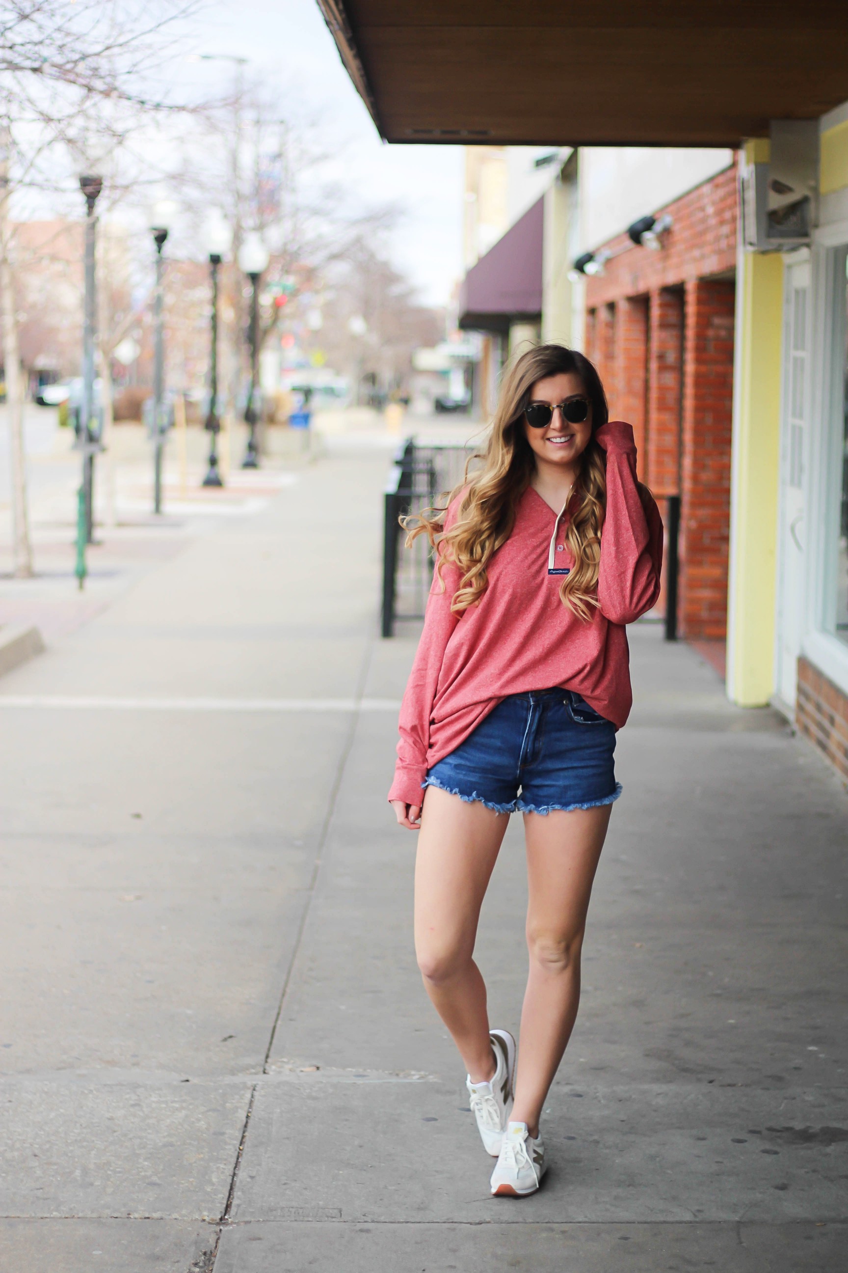 This slouchy boyfriend tee is so comfortable! I love comfy shirts, this one is by Lauren James and comes in so many colors! I paired it with Ray Ban Clubmaster Sunglasses, shorts, and my favorite Gold New Balance sneakers! By Lauren Lindmark and daily dose of charm dailydoseofcharm.com