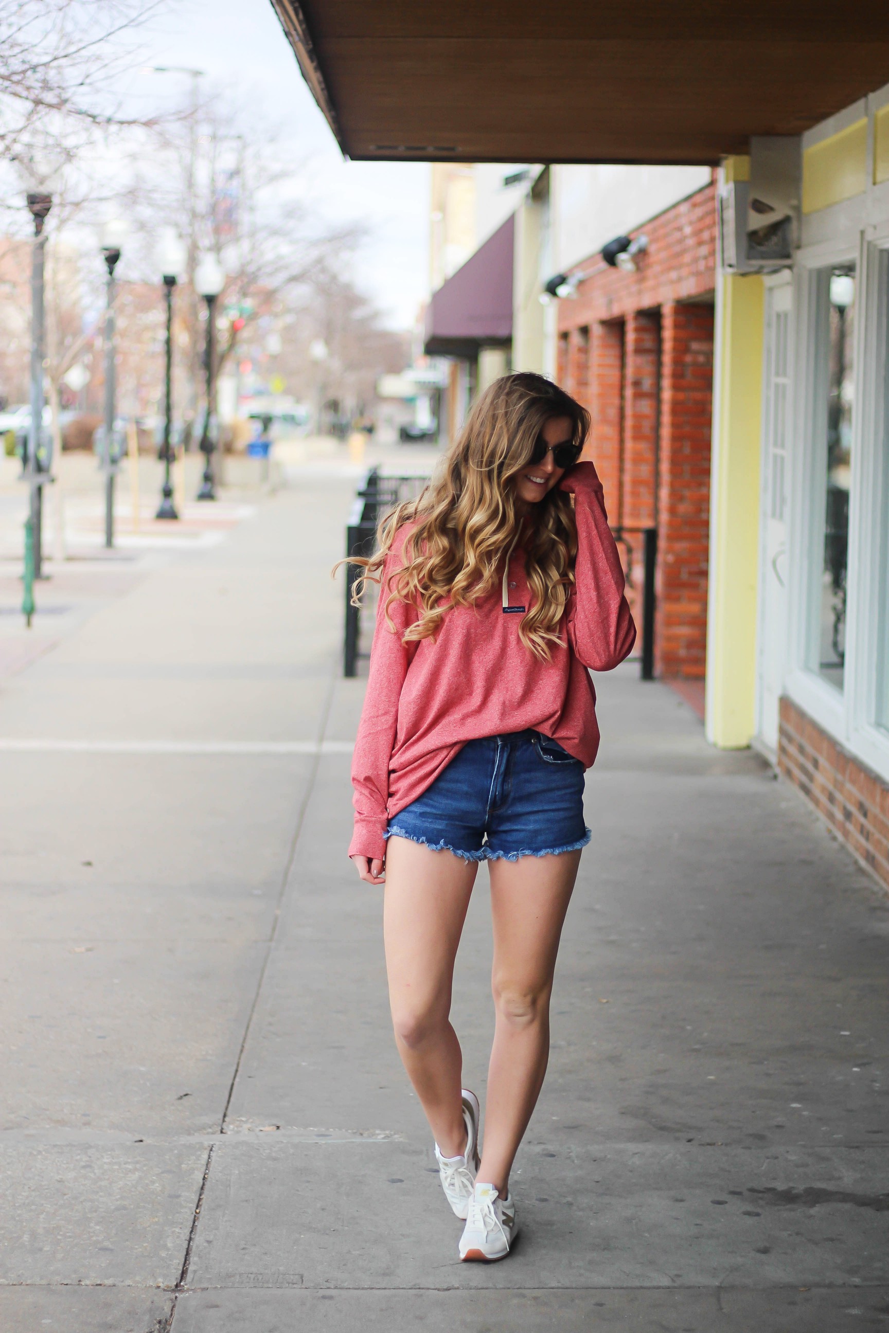 This slouchy boyfriend tee is so comfortable! I love comfy shirts, this one is by Lauren James and comes in so many colors! I paired it with Ray Ban Clubmaster Sunglasses, shorts, and my favorite Gold New Balance sneakers! By Lauren Lindmark and daily dose of charm dailydoseofcharm.com