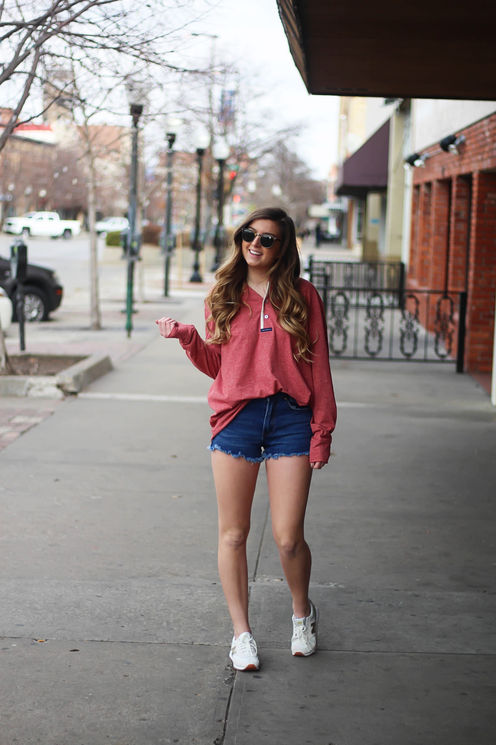 This slouchy boyfriend tee is so comfortable! I love comfy shirts, this one is by Lauren James and comes in so many colors! I paired it with Ray Ban Clubmaster Sunglasses, shorts, and my favorite Gold New Balance sneakers! By Lauren Lindmark and daily dose of charm dailydoseofcharm.com