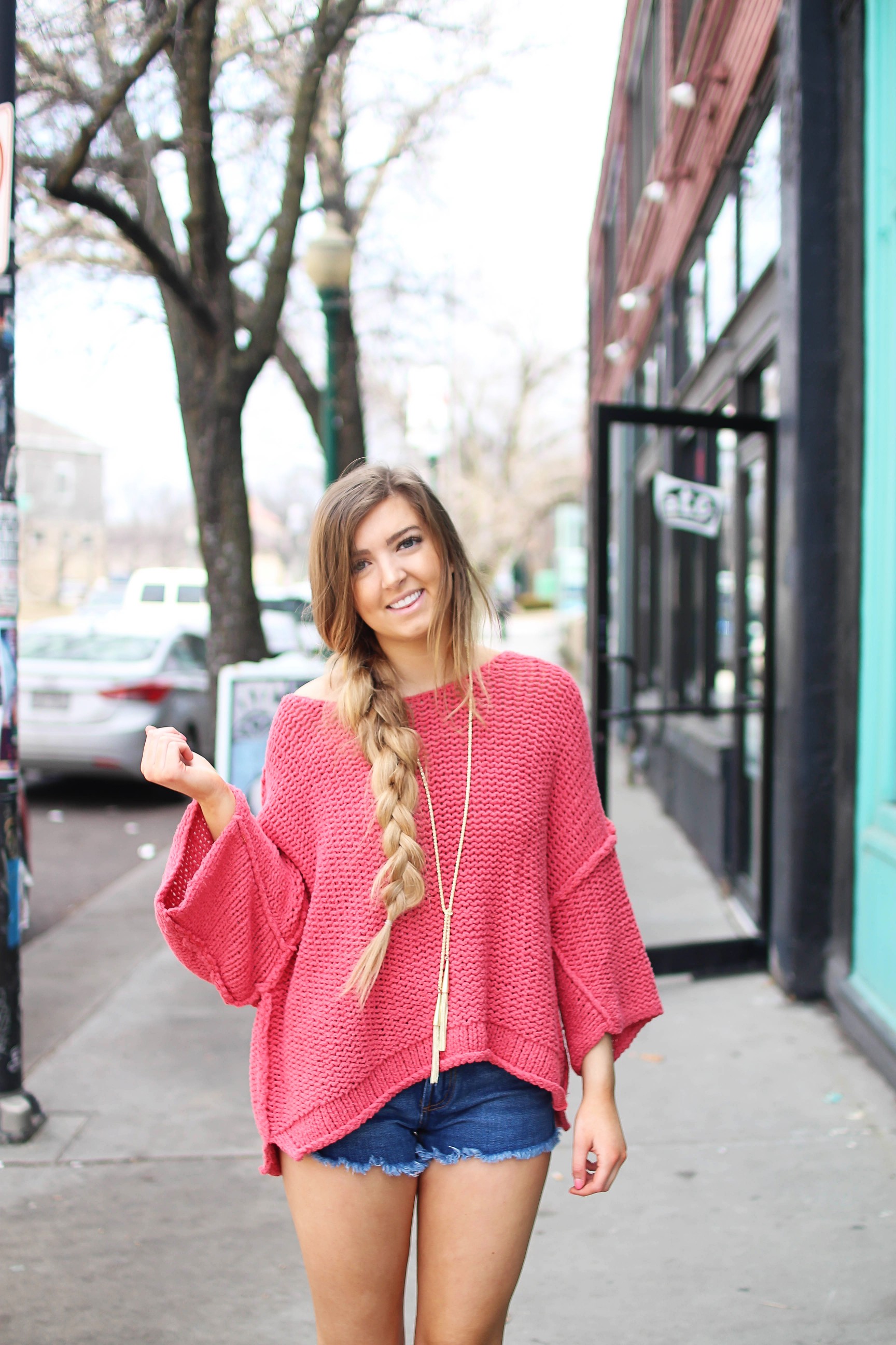 The perfect slouchy sweater! I love this coral off the shoulder sweater, it's perfectly oversized for my frayed shorts! I paired it with my favorite tied Kendra Scott necklace and tory burch sandals by Lauren Lindmark on daily dose of charm dailydoseofcharm.com