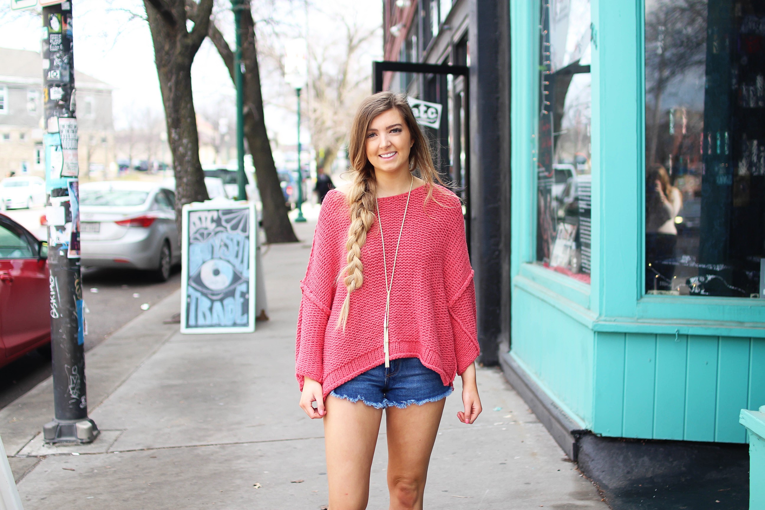 The perfect slouchy sweater! I love this coral off the shoulder sweater, it's perfectly oversized for my frayed shorts! I paired it with my favorite tied Kendra Scott necklace and tory burch sandals by Lauren Lindmark on daily dose of charm dailydoseofcharm.com