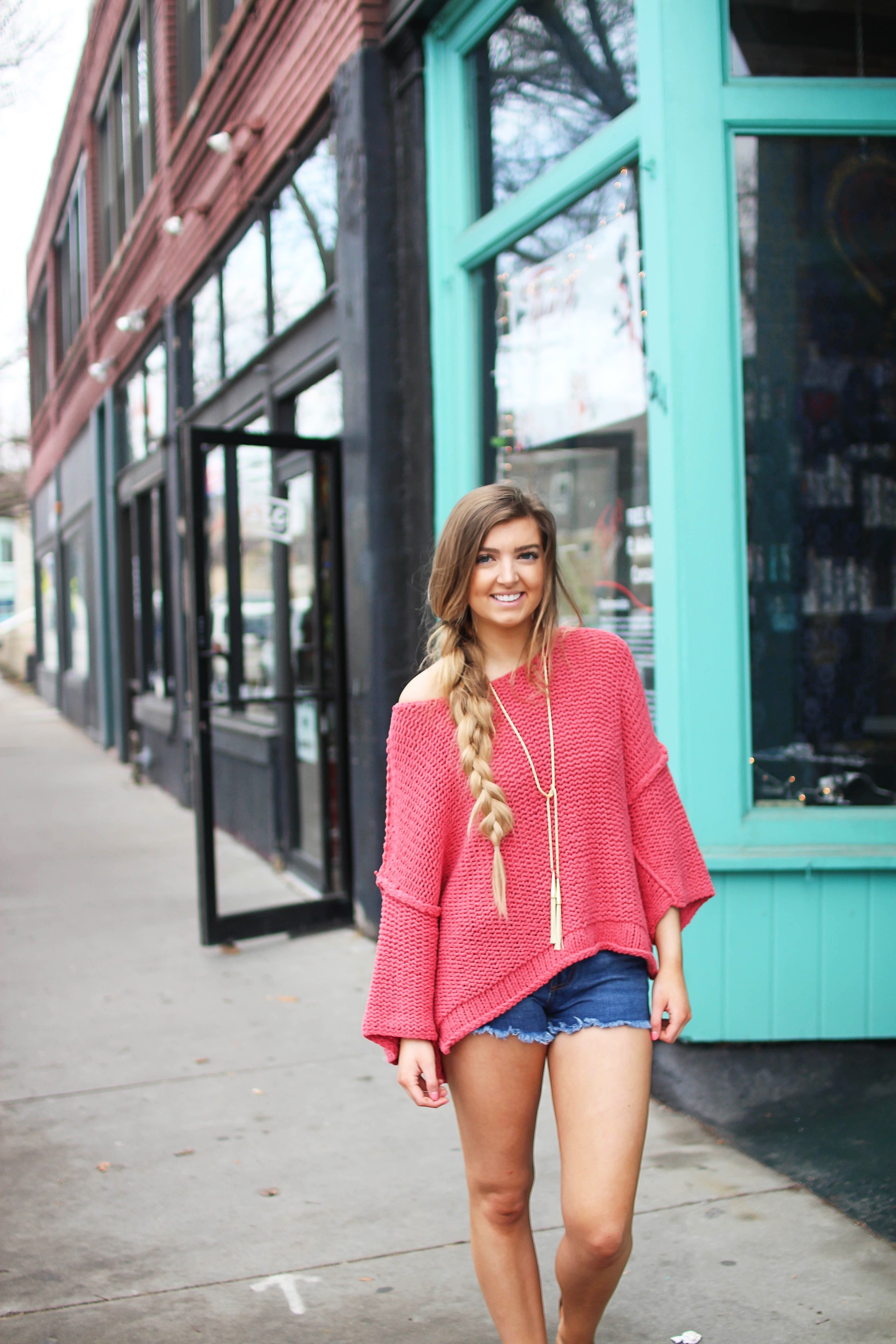 The perfect slouchy sweater! I love this coral off the shoulder sweater, it's perfectly oversized for my frayed shorts! I paired it with my favorite tied Kendra Scott necklace and tory burch sandals by Lauren Lindmark on daily dose of charm dailydoseofcharm.com