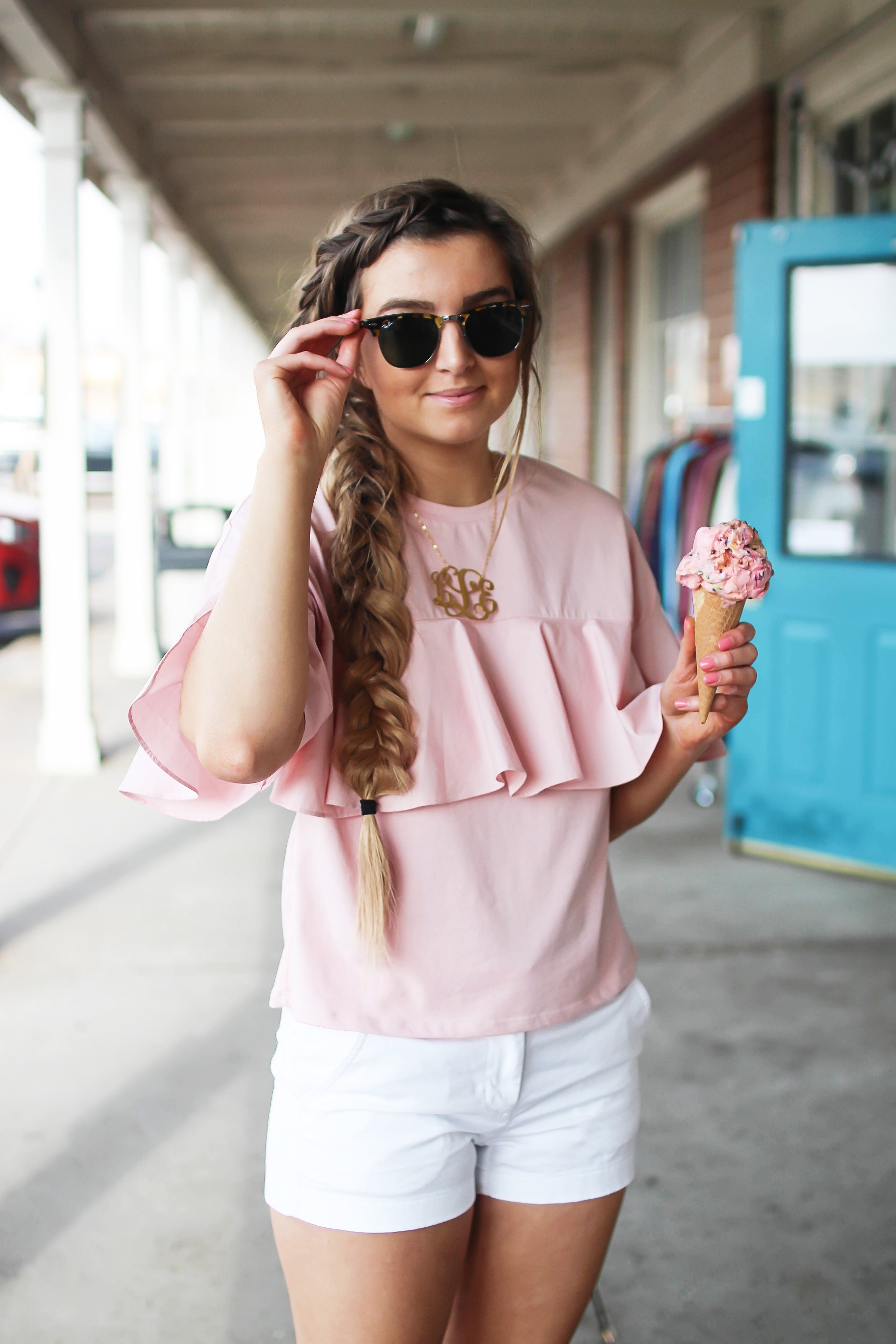 The cutest ruffle top you will ever find is only $35! I love this pink full shirt, I can't stop wearing it! I paired it with my white j.crew chino shorts and my 2.5" monogram necklace. I am also wearing my favorite ray ban club master sunglasses. By Lauren Lindmark on dailydoseofcharm.com daily dose of charm