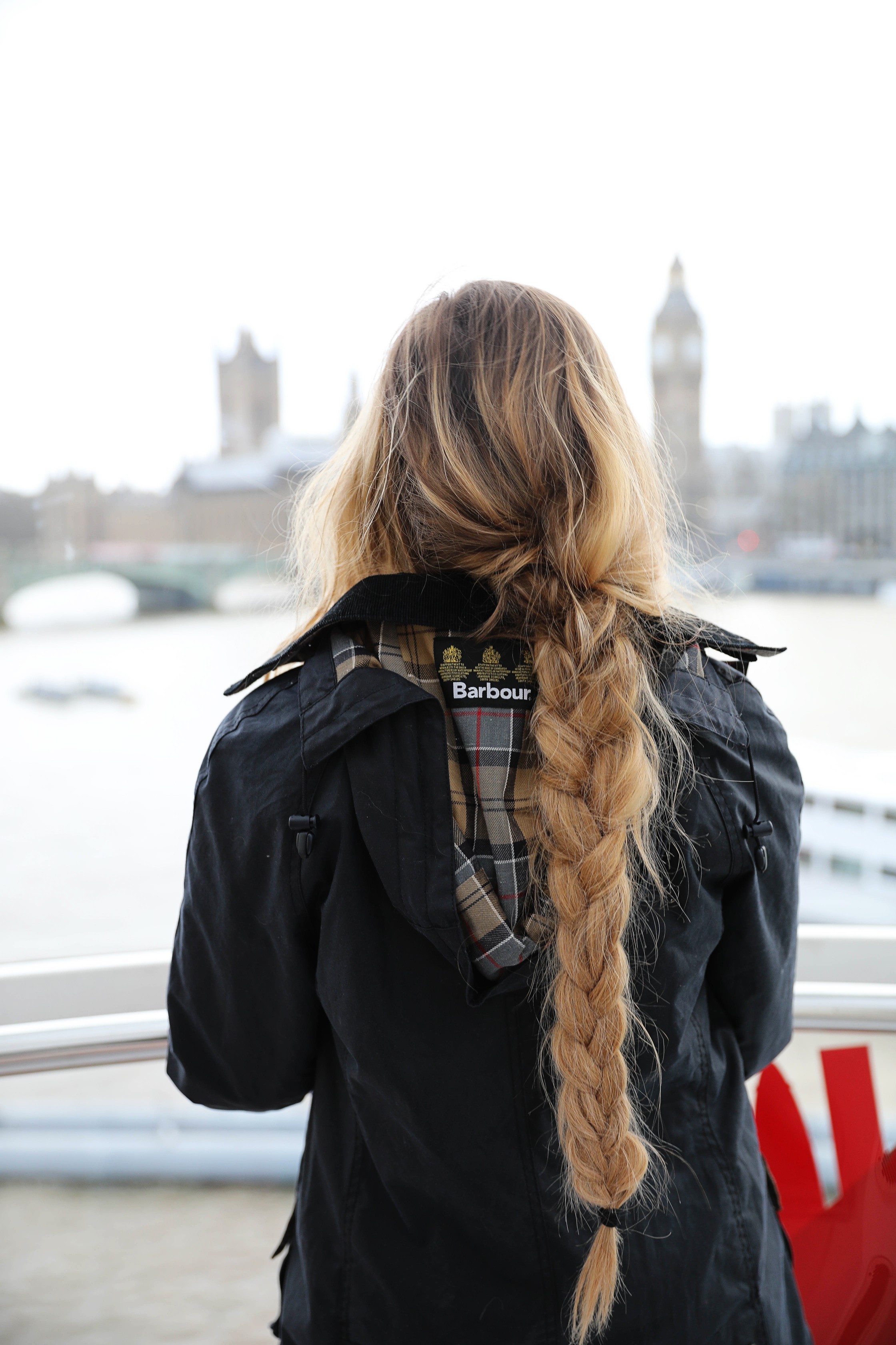 London Adventure post! Photos from the London Eye! Wearing a Barbour coat and England crewneck with my favorite gold sneakers by new balance! By Lauren Lindmark on daily dose of charm dailydoseofcharm.com