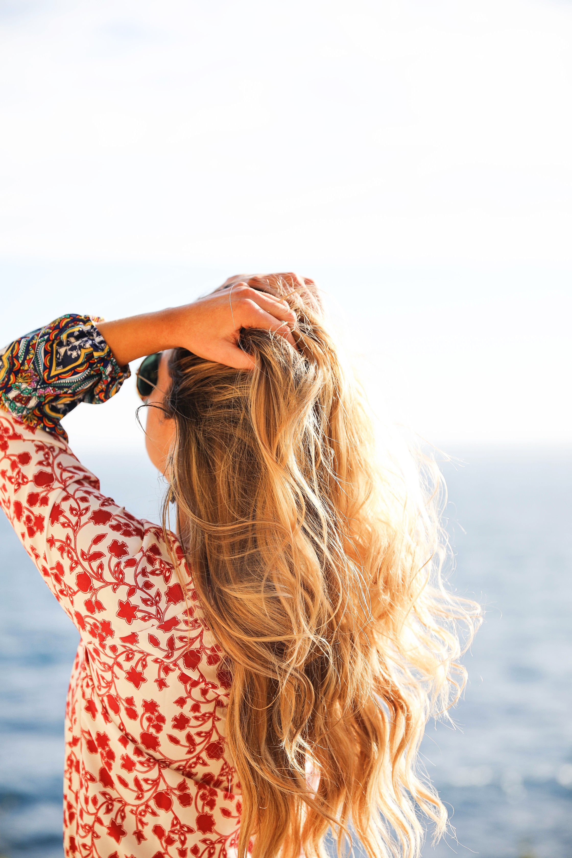 Romper by the ocean in Nice, France. The perfect outfit for a beach day! By Lauren Lindmark on dailydoseofcharm.com daily dose of charm fashion blog