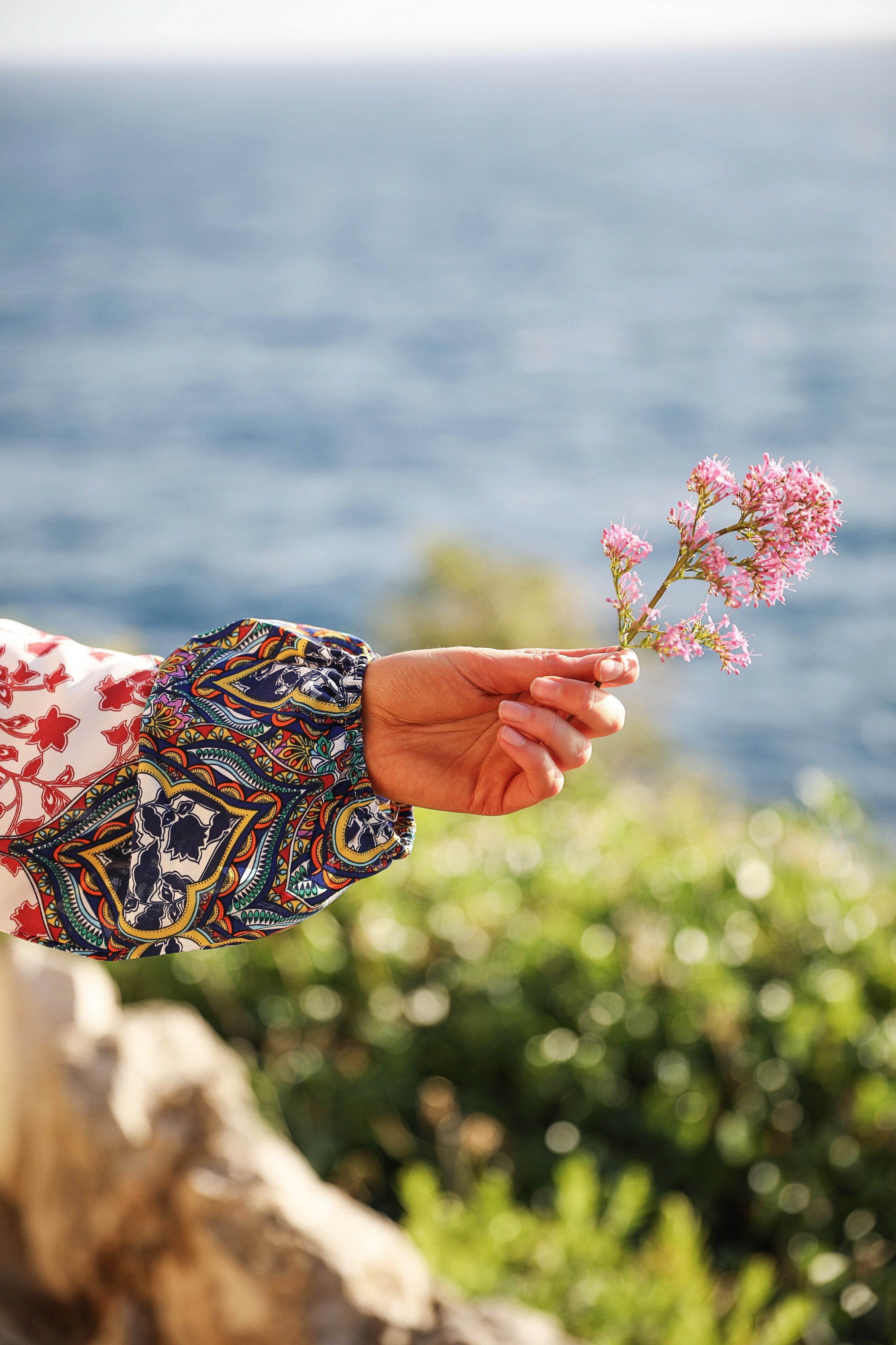 Romper by the ocean in Nice, France. The perfect outfit for a beach day! By Lauren Lindmark on dailydoseofcharm.com daily dose of charm fashion blog