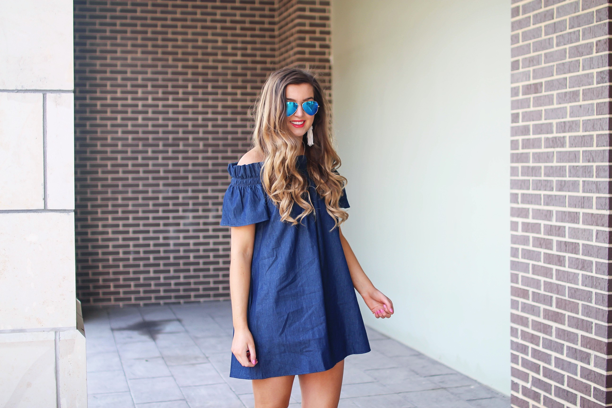 Denim off the shoulder dress! I love the denim trend for spring and this dress is a perfect addition to your closet! I paired it with brown wedges and Lisi Lerch tassel earrings. Also my blue ray ban aviators that are on sale! By Lauren Lindmark on dailydoseofcharm.com daily dose of charm