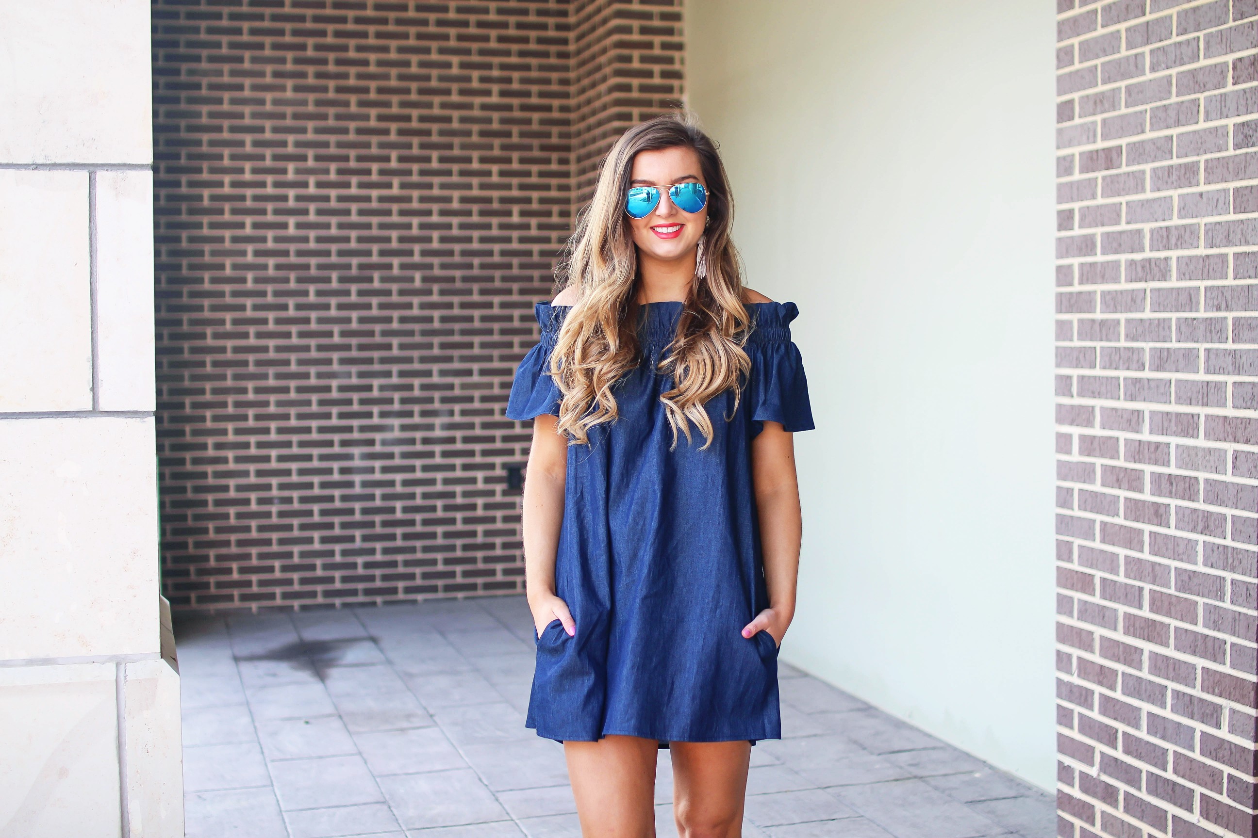 Denim off the shoulder dress! I love the denim trend for spring and this dress is a perfect addition to your closet! I paired it with brown wedges and Lisi Lerch tassel earrings. Also my blue ray ban aviators that are on sale! By Lauren Lindmark on dailydoseofcharm.com daily dose of charm