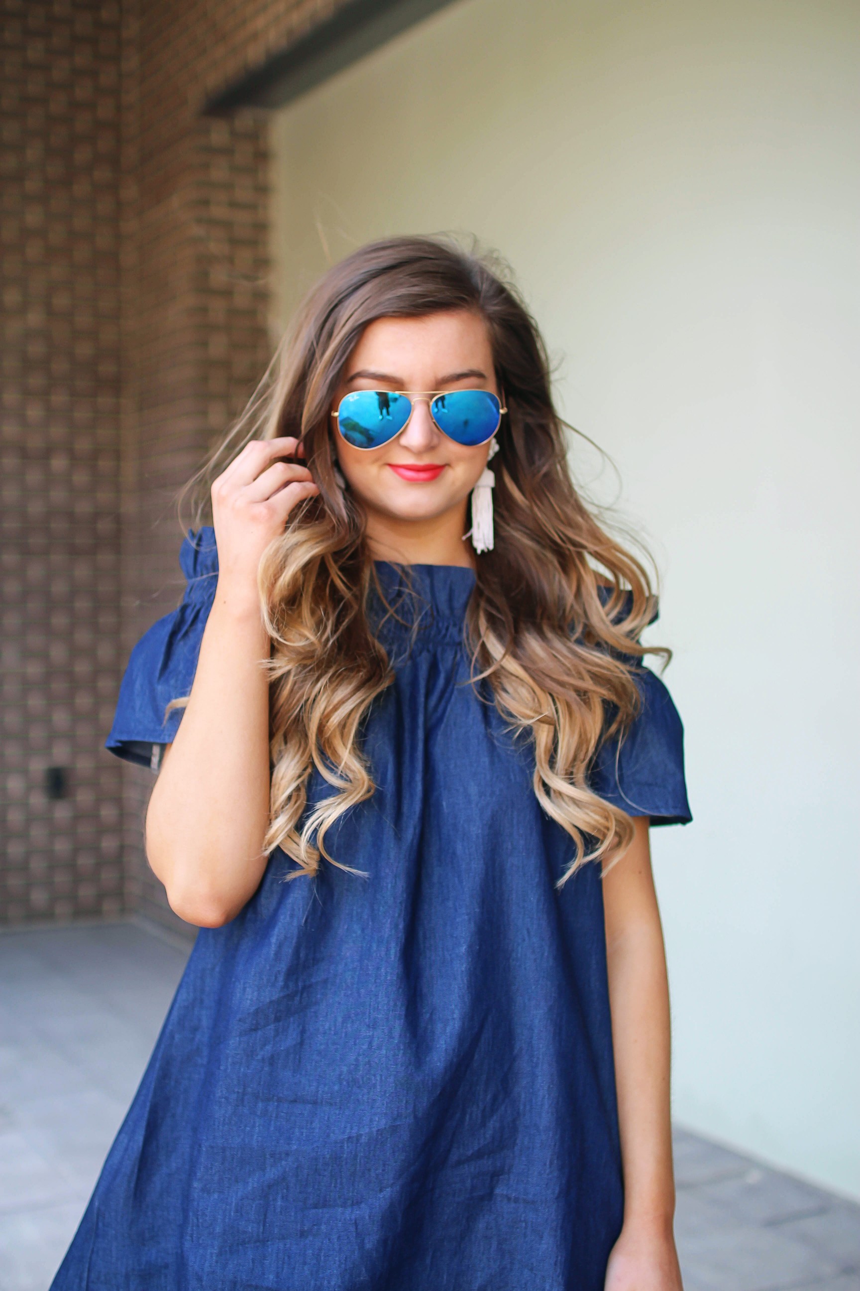 Denim off the shoulder dress! I love the denim trend for spring and this dress is a perfect addition to your closet! I paired it with brown wedges and Lisi Lerch tassel earrings. Also my blue ray ban aviators that are on sale! By Lauren Lindmark on dailydoseofcharm.com daily dose of charm