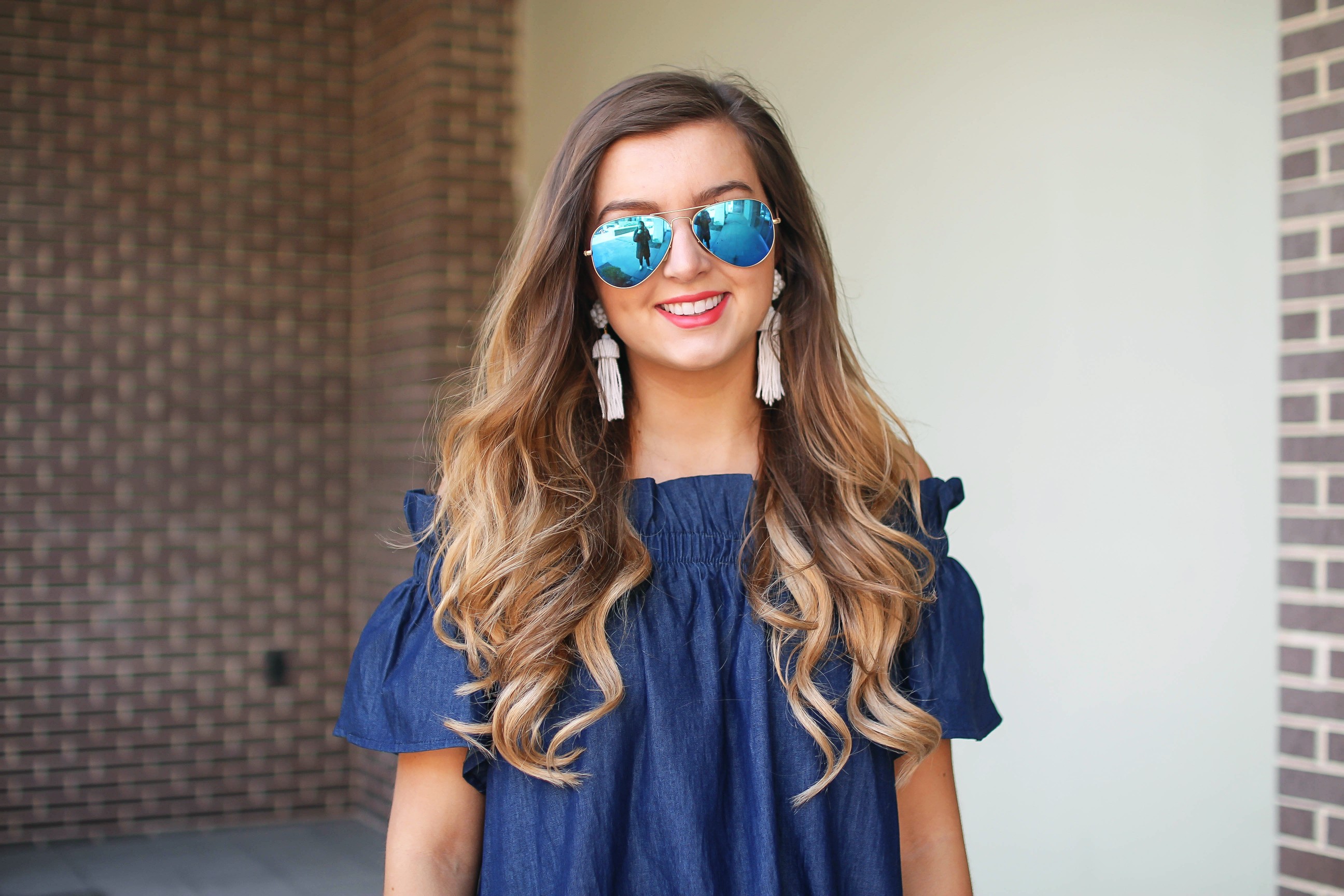 Denim off the shoulder dress! I love the denim trend for spring and this dress is a perfect addition to your closet! I paired it with brown wedges and Lisi Lerch tassel earrings. Also my blue ray ban aviators that are on sale! By Lauren Lindmark on dailydoseofcharm.com daily dose of charm