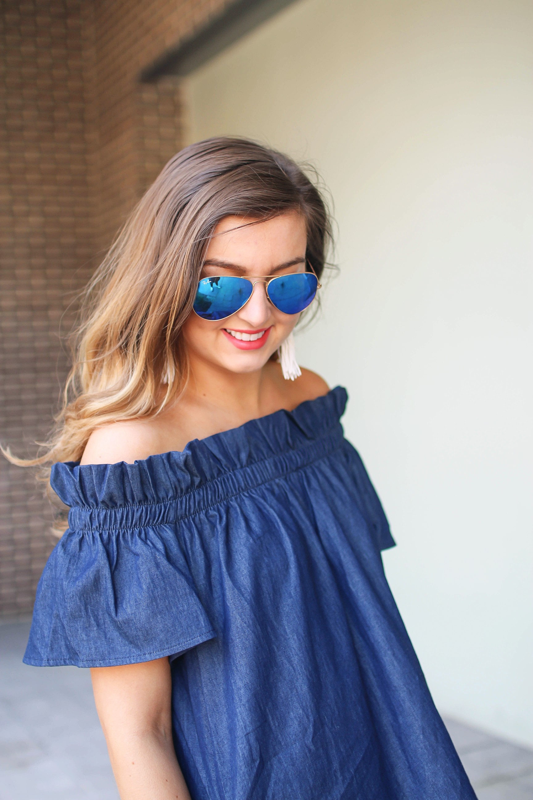 Denim off the shoulder dress! I love the denim trend for spring and this dress is a perfect addition to your closet! I paired it with brown wedges and Lisi Lerch tassel earrings. Also my blue ray ban aviators that are on sale! By Lauren Lindmark on dailydoseofcharm.com daily dose of charm