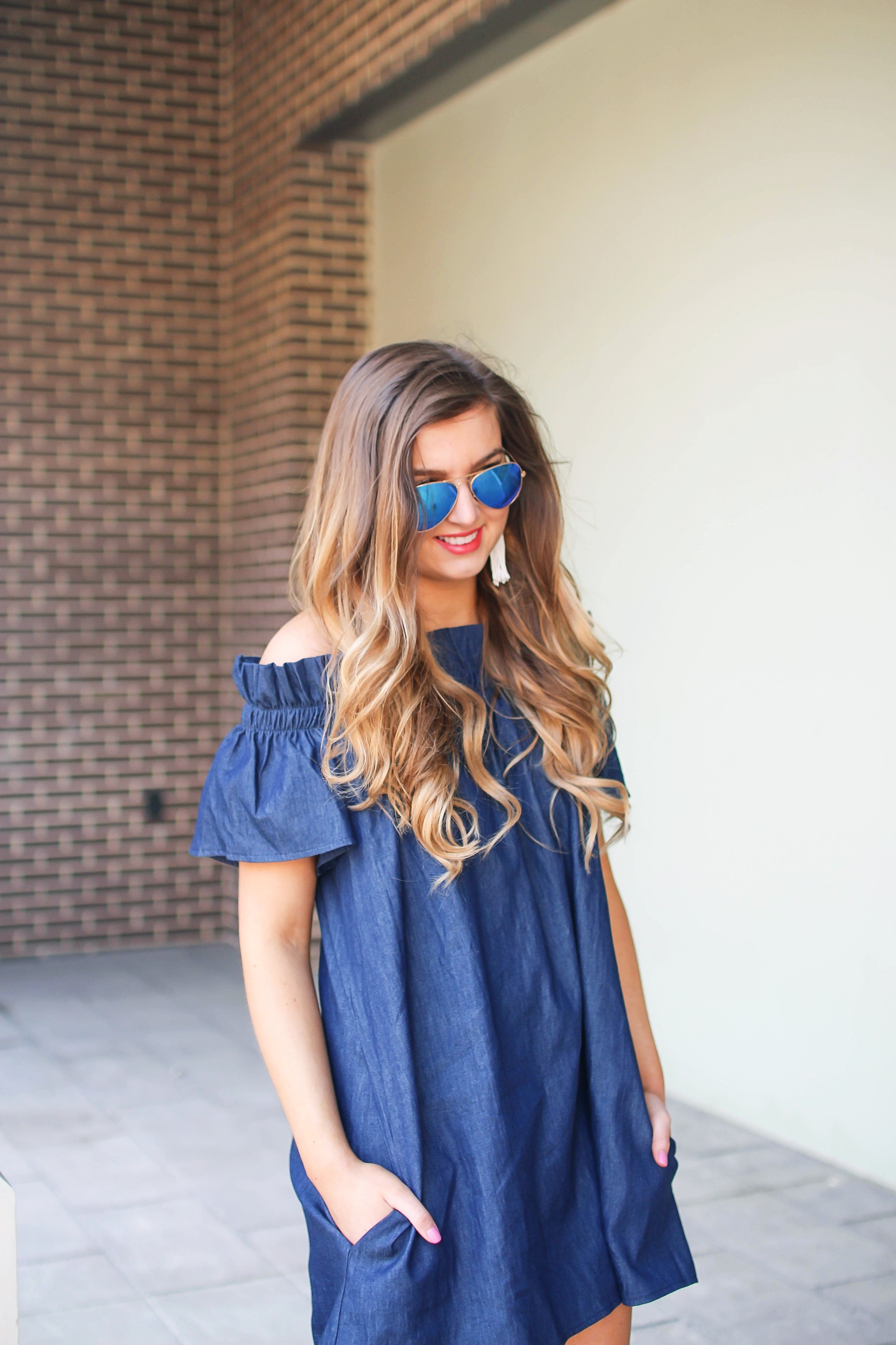 Denim off the shoulder dress! I love the denim trend for spring and this dress is a perfect addition to your closet! I paired it with brown wedges and Lisi Lerch tassel earrings. Also my blue ray ban aviators that are on sale! By Lauren Lindmark on dailydoseofcharm.com daily dose of charm