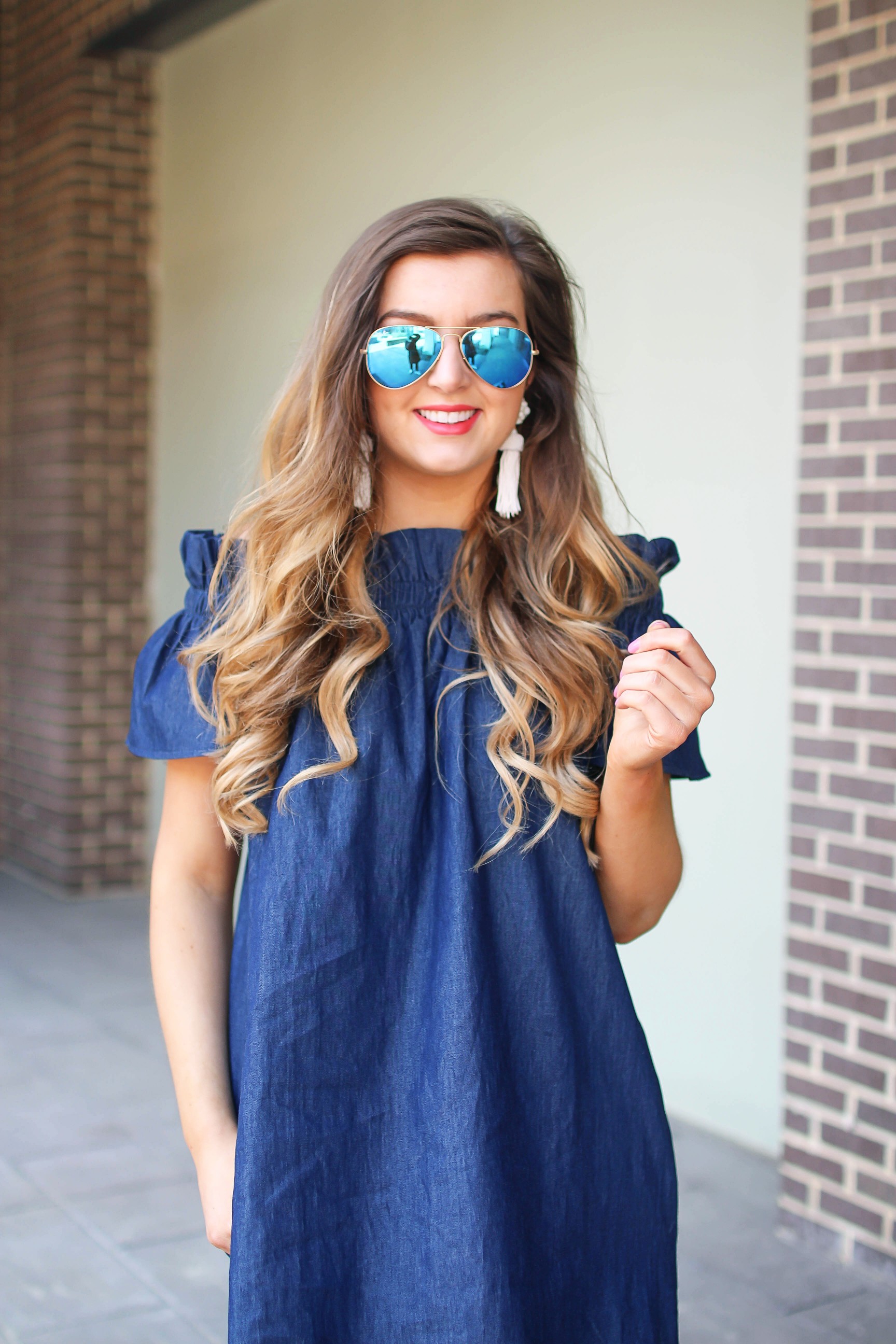 Denim off the shoulder dress! I love the denim trend for spring and this dress is a perfect addition to your closet! I paired it with brown wedges and Lisi Lerch tassel earrings. Also my blue ray ban aviators that are on sale! By Lauren Lindmark on dailydoseofcharm.com daily dose of charm