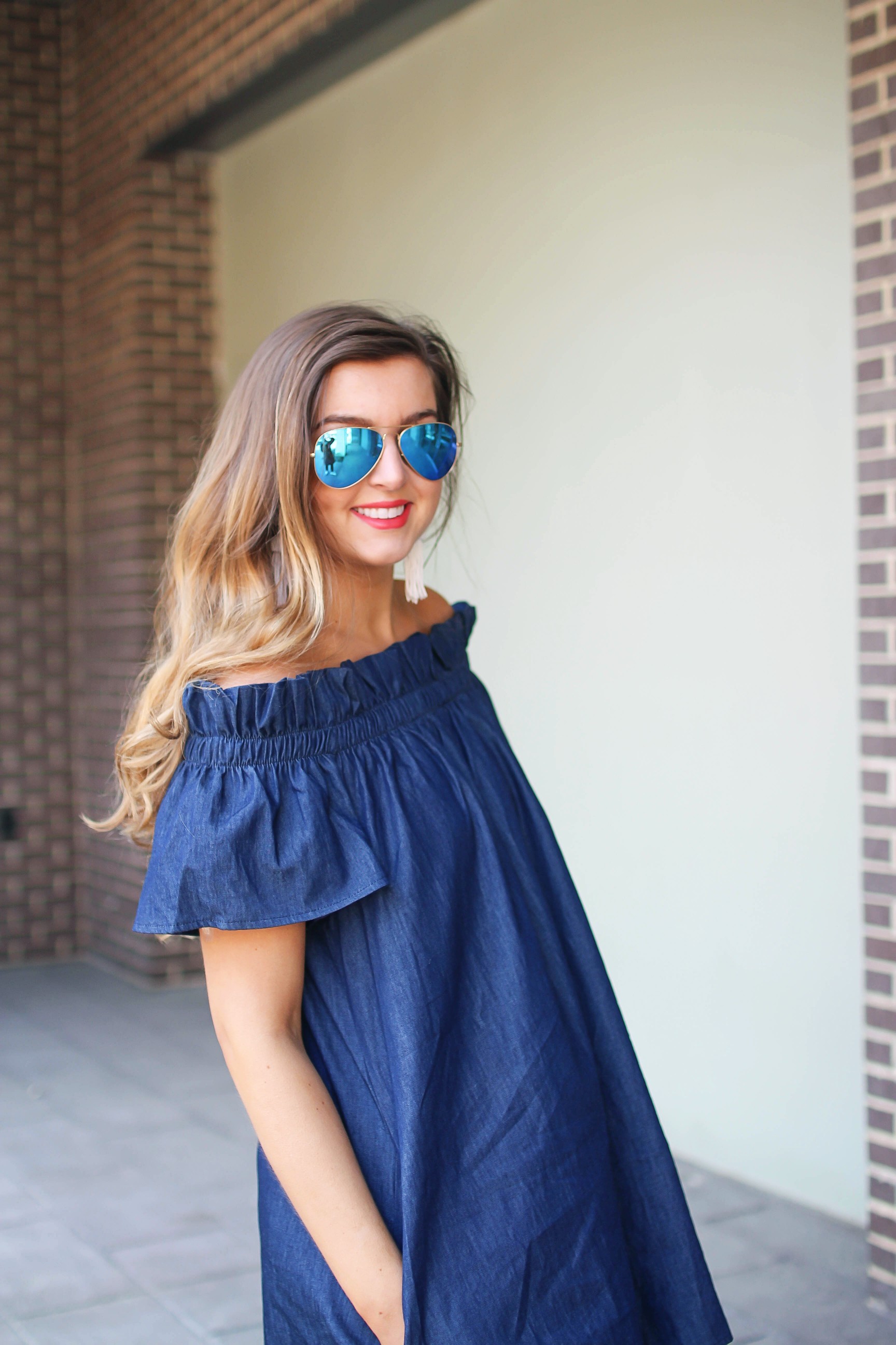 Denim off the shoulder dress! I love the denim trend for spring and this dress is a perfect addition to your closet! I paired it with brown wedges and Lisi Lerch tassel earrings. Also my blue ray ban aviators that are on sale! By Lauren Lindmark on dailydoseofcharm.com daily dose of charm