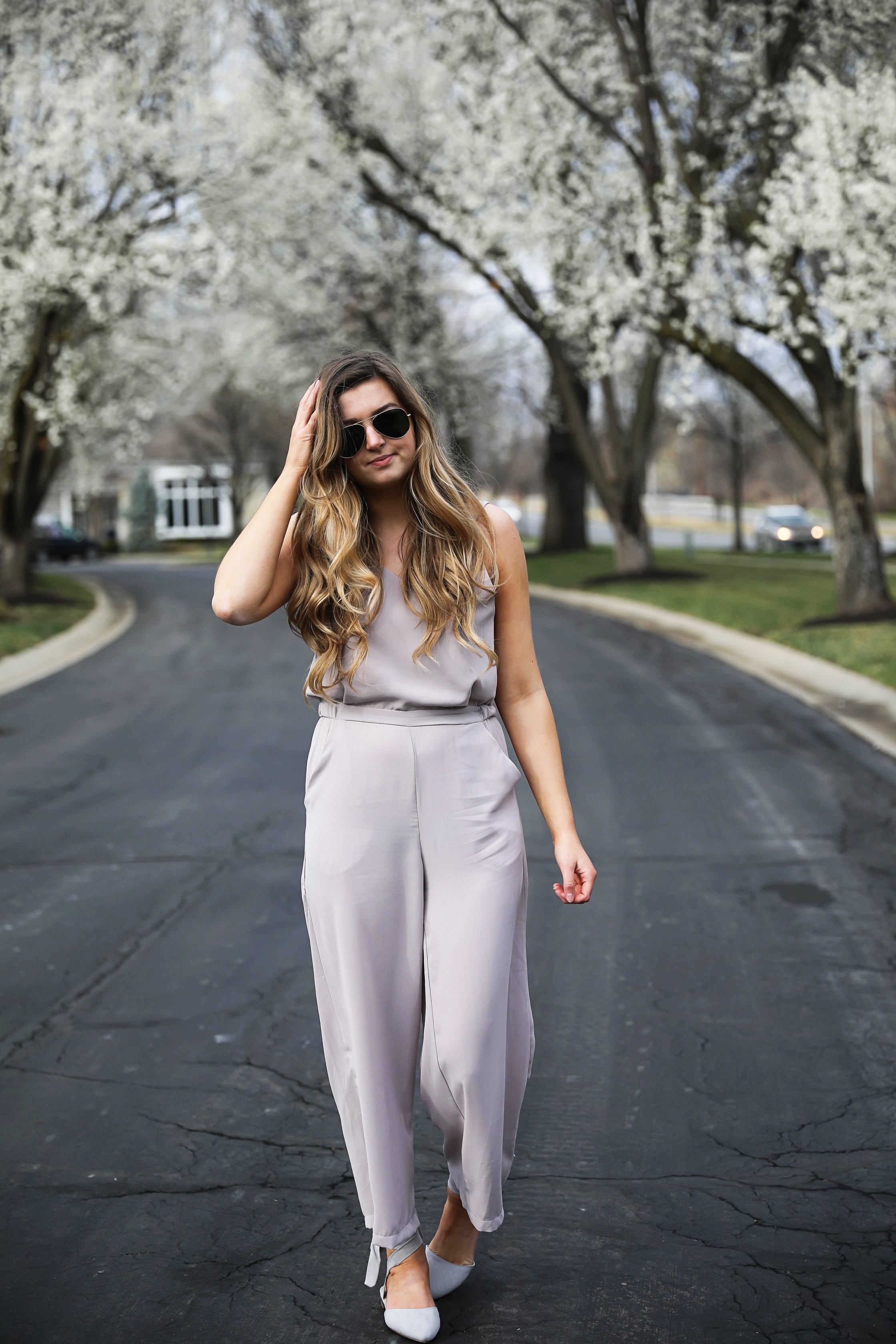 Light Pink Flowy Jumpsuit! Paired with the cutest tied flats and ray ban aviators! By Lauren Lindmark on Daily Dose of Charm dailydoseofcharm.com