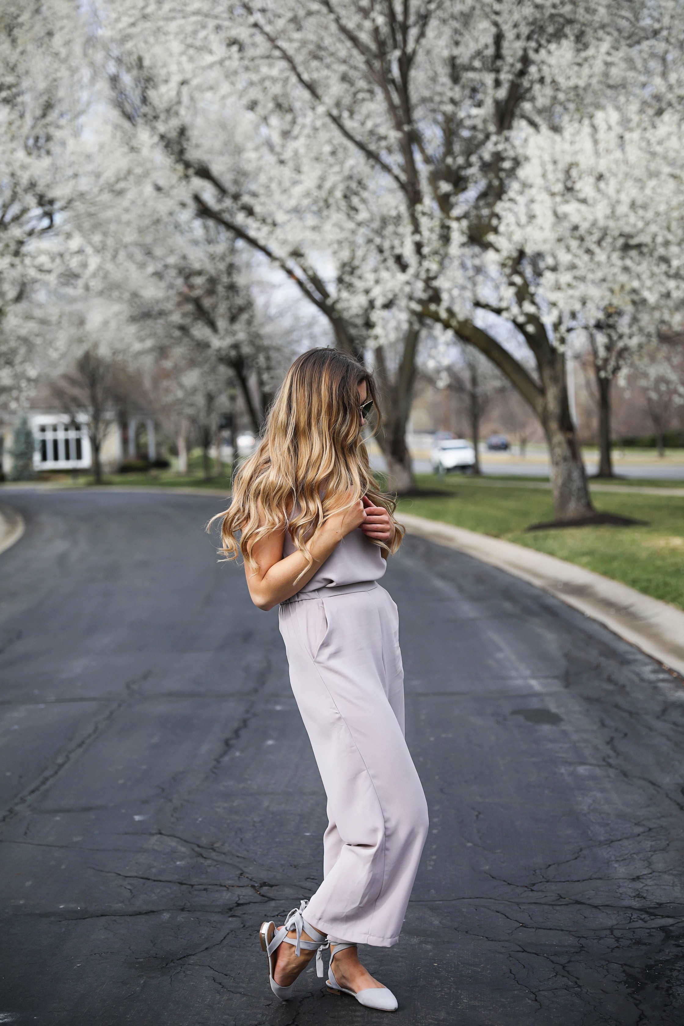 Light Pink Flowy Jumpsuit! Paired with the cutest tied flats and ray ban aviators! By Lauren Lindmark on Daily Dose of Charm dailydoseofcharm.com