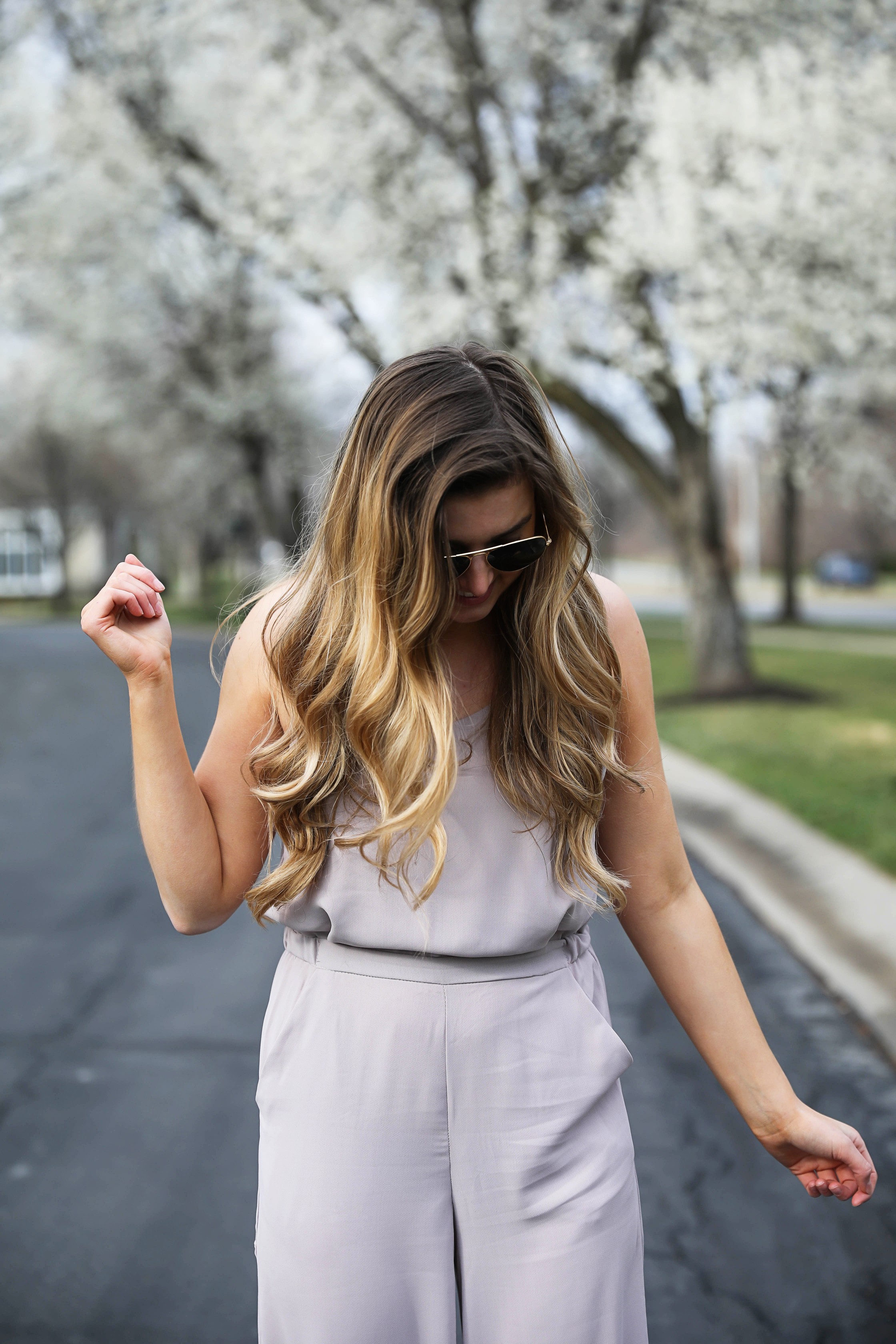 Light Pink Flowy Jumpsuit! Paired with the cutest tied flats and ray ban aviators! By Lauren Lindmark on Daily Dose of Charm dailydoseofcharm.com