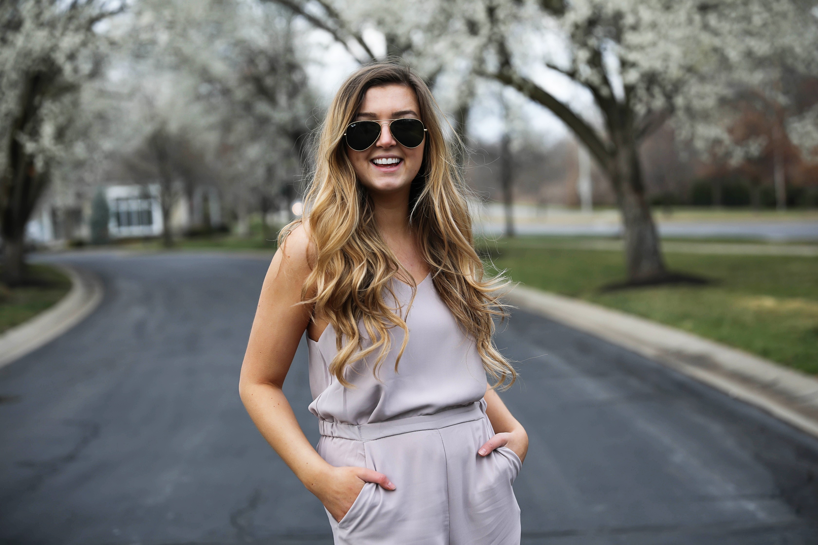 Light Pink Flowy Jumpsuit! Paired with the cutest tied flats and ray ban aviators! By Lauren Lindmark on Daily Dose of Charm dailydoseofcharm.com