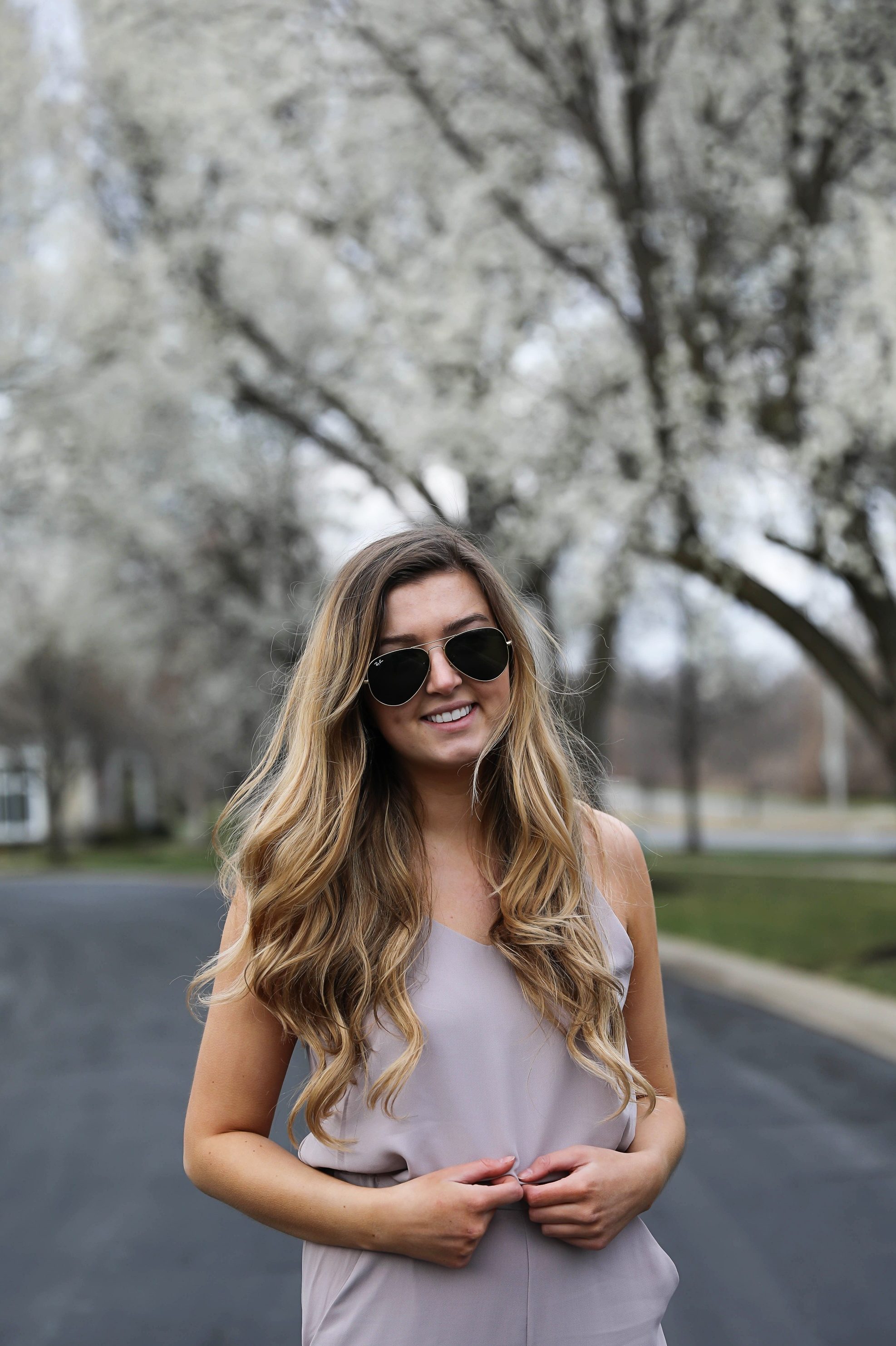 Light Pink Flowy Jumpsuit! Paired with the cutest tied flats and ray ban aviators! By Lauren Lindmark on Daily Dose of Charm dailydoseofcharm.com