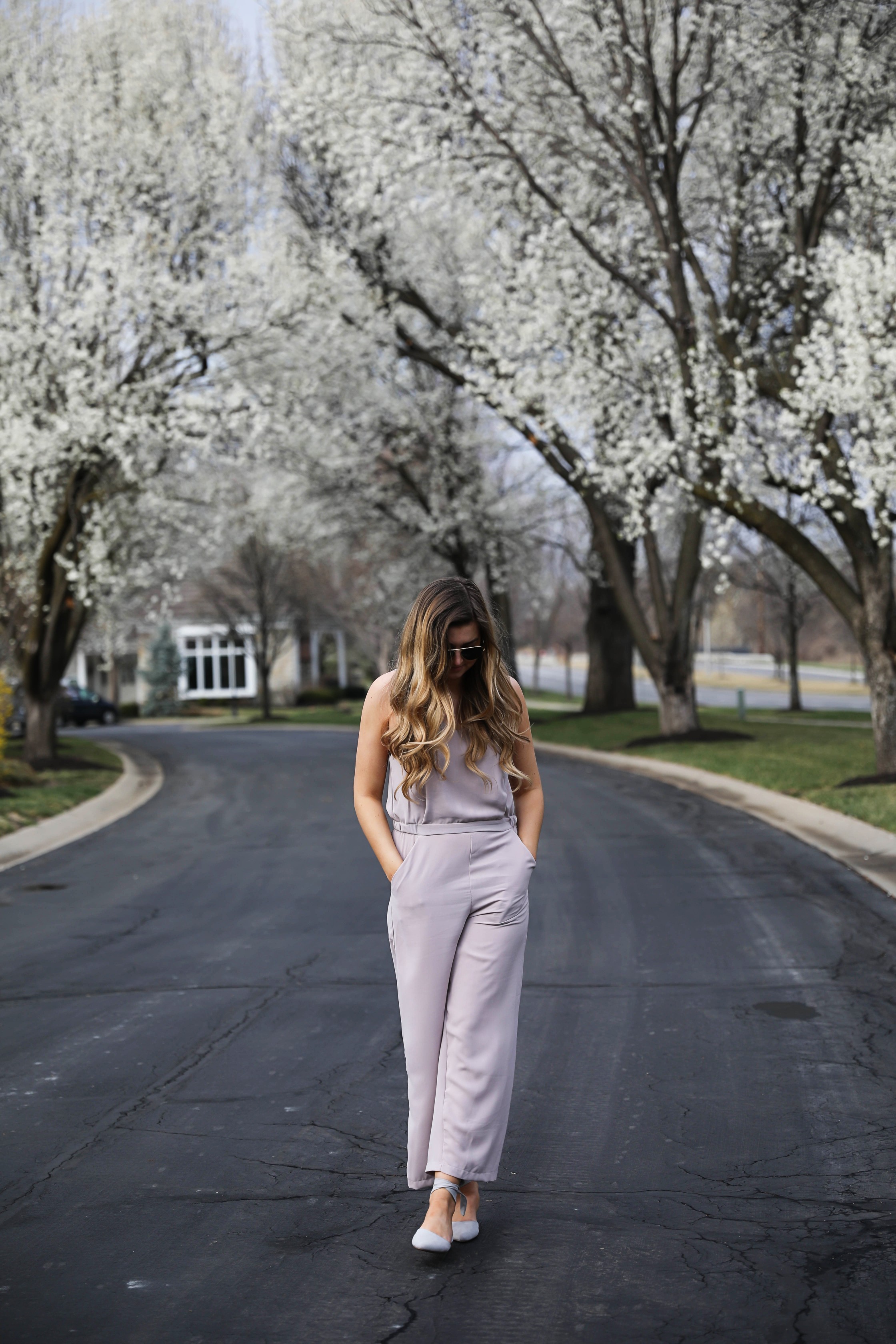 Light Pink Flowy Jumpsuit! Paired with the cutest tied flats and ray ban aviators! By Lauren Lindmark on Daily Dose of Charm dailydoseofcharm.com