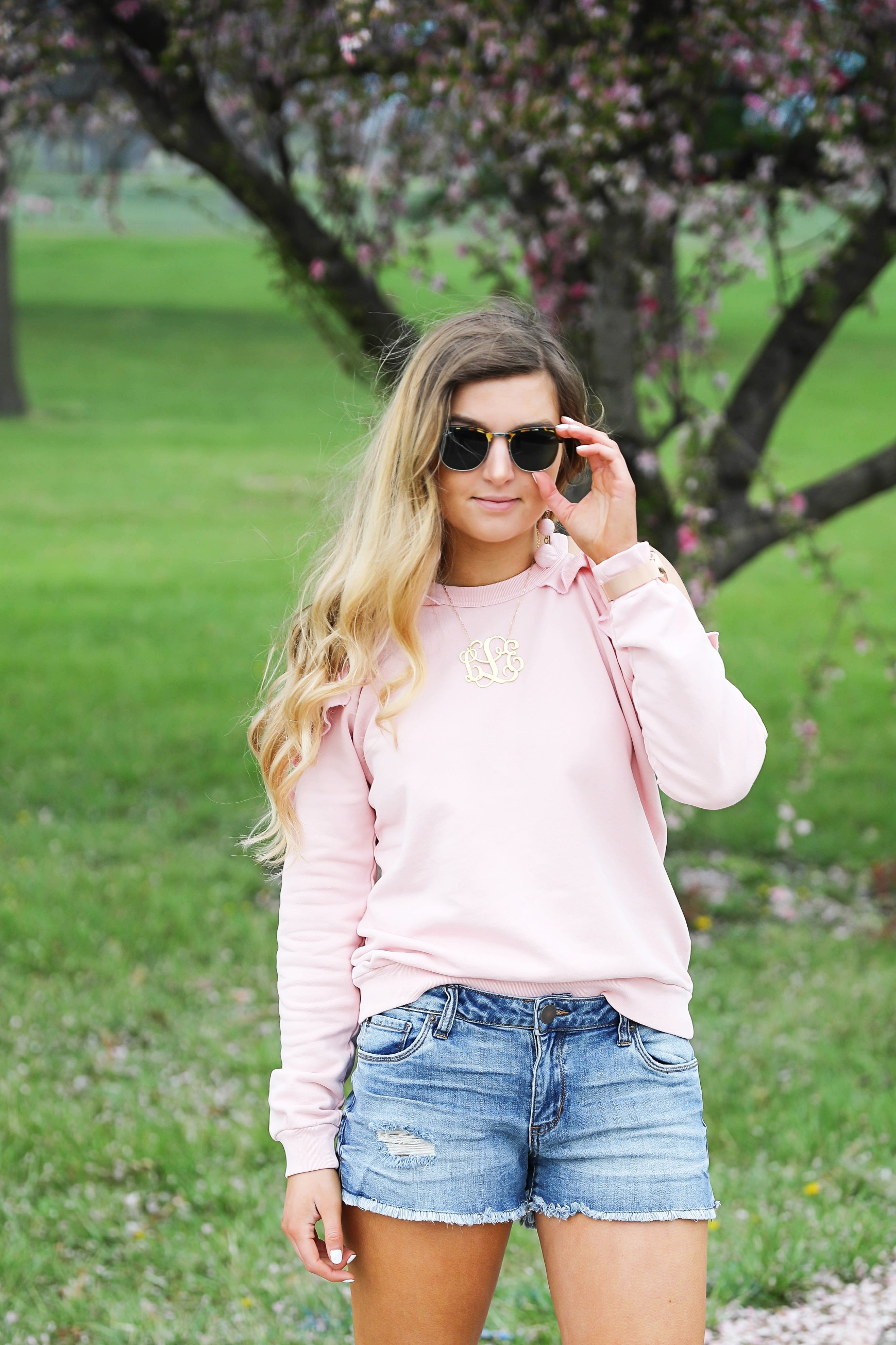 The perfect spring outfit! I love this light pink cold shoulder ruffle top. SO many spring trends in one outfit! Fashion blog by Lauren Lindmark Daily Dose of Charm dailydoseofcharm.com