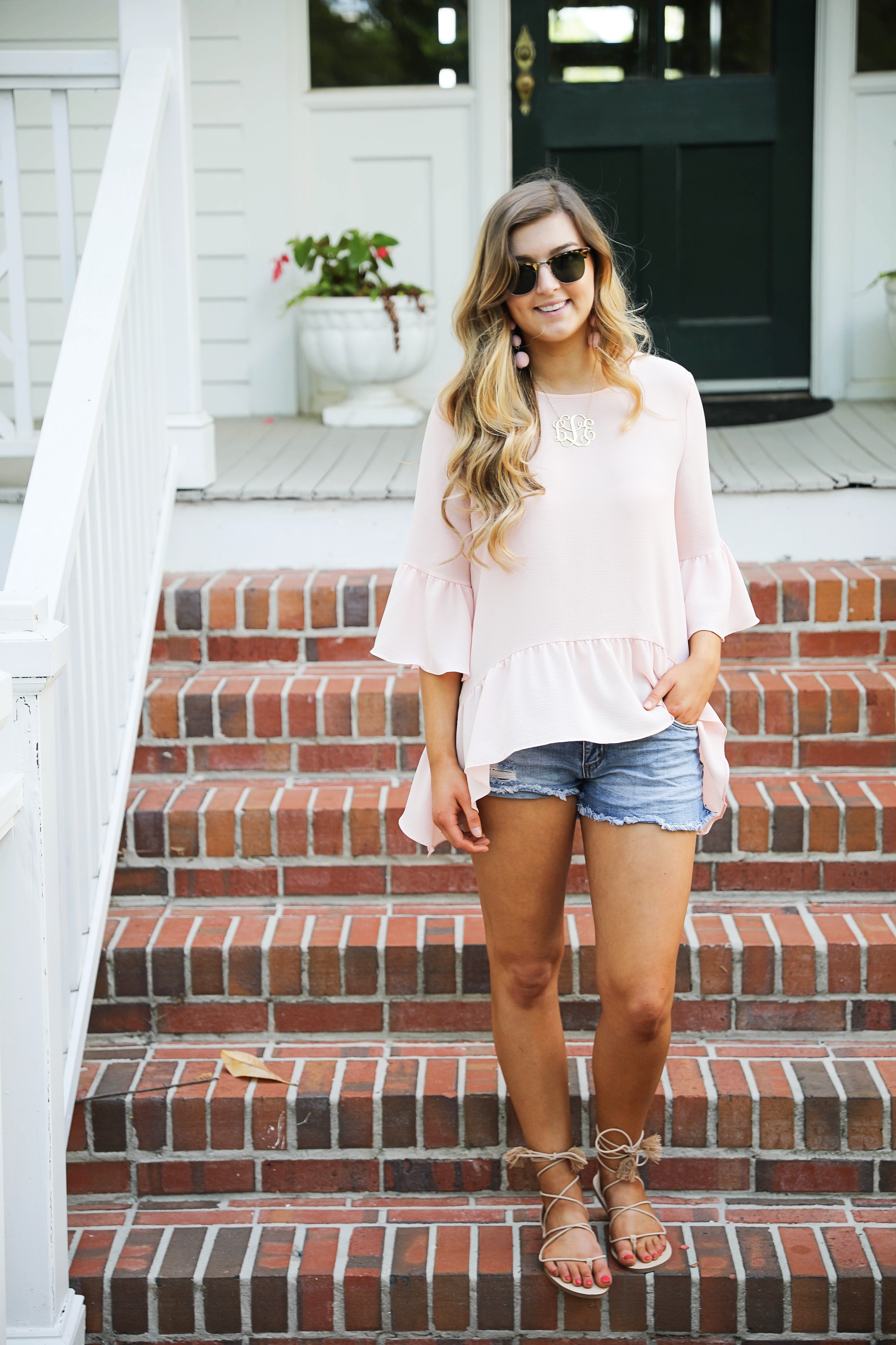 Flowy pink peplum top perfect for a southern outfit! Georgia porch outfit from Nordstrom. By fashion blogger Lauren Lindmark on dailydoseofcharm.com daily dose of charm