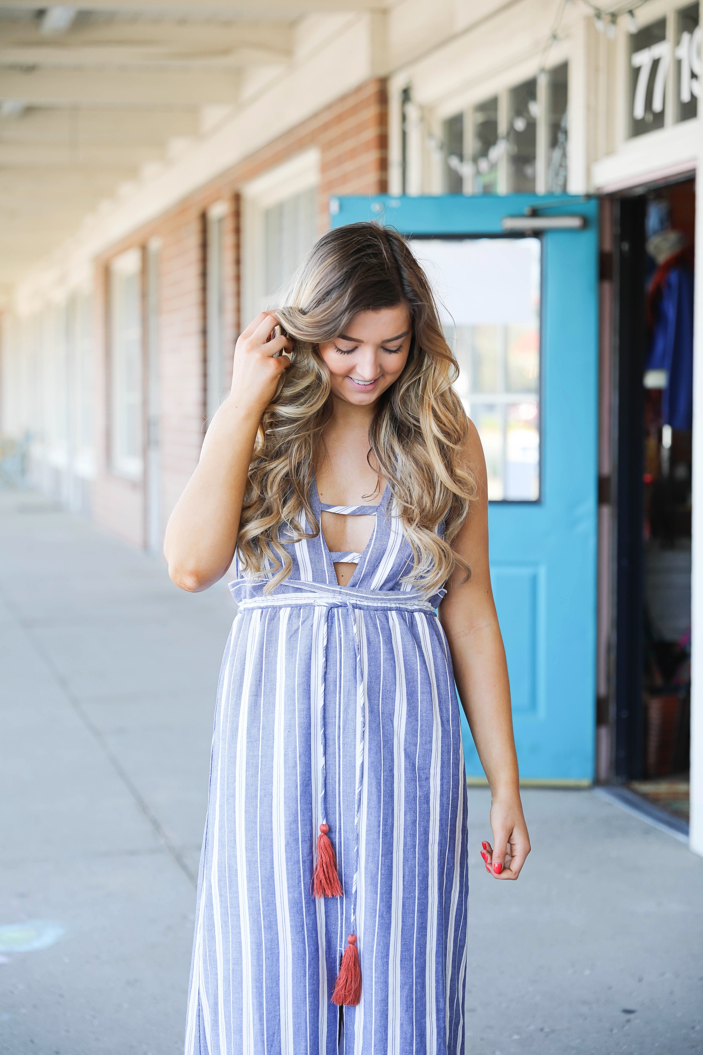 How cute is this Nautical Striped Tassel Dress? I have been loving dresses for spring and summer and this one is one of my favorites! Perfect for boating or days by the beach. By Lauren Lindmark on daily dose of charm dailydoseofcharm.com