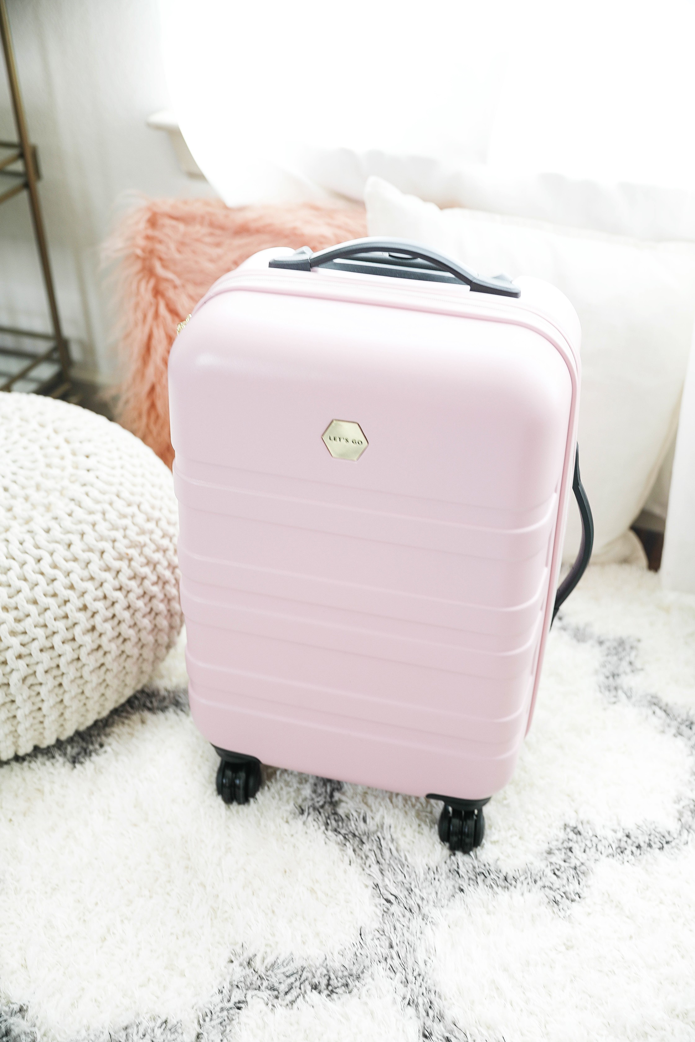 Packing tips and travel tips for frequent flyers! How to travel easier plus cute suitcases. On the blog Daily Dose of Charm by Lauren Lindmark dailydoseofcharm.com