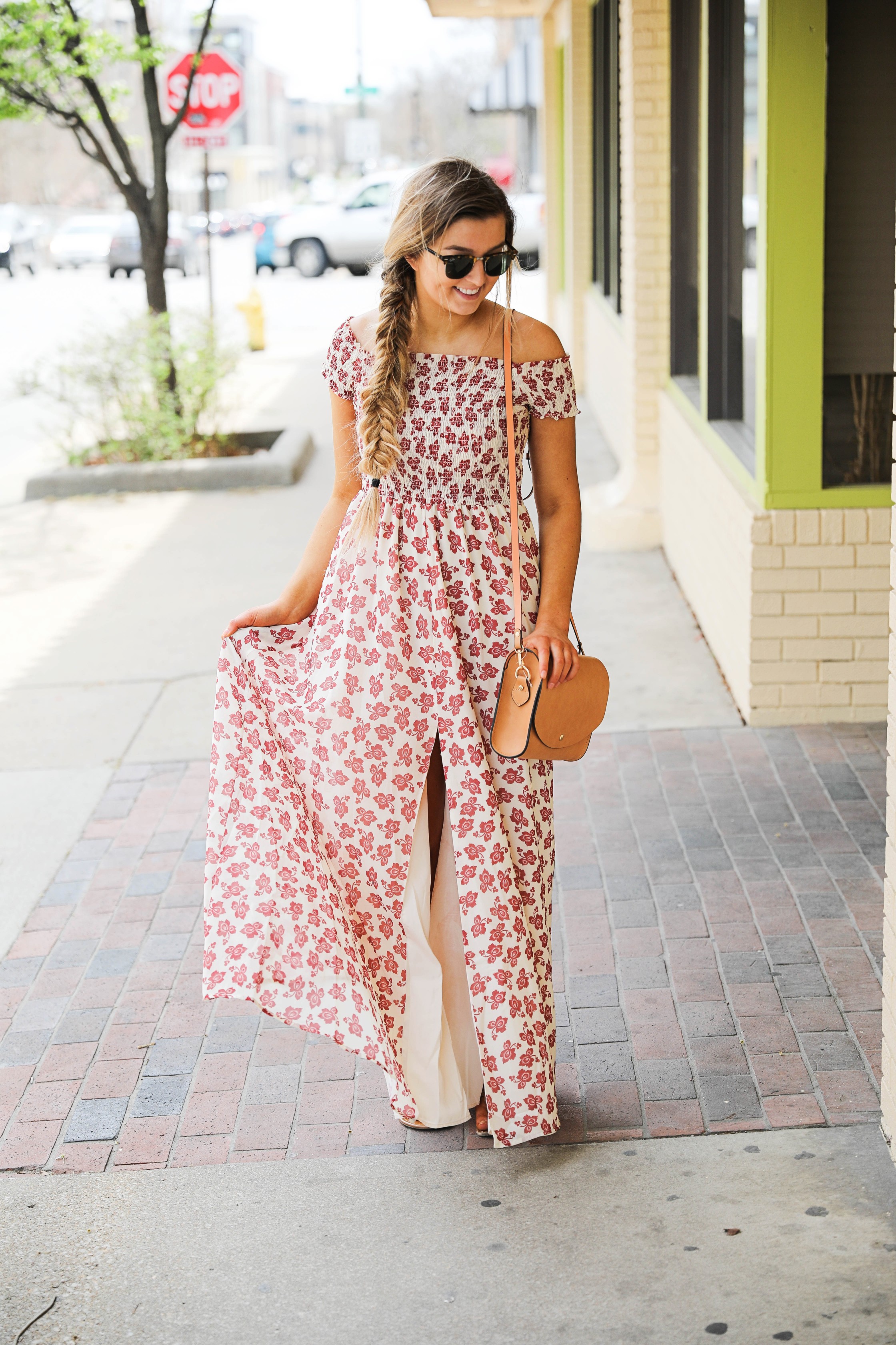 The prettiest floral off the shoulder dress for spring and summer! I am a sucker for a cute floral dress. I love the slit on the front of this dress and I paired it with a brown leather bag and sunglasses! By Lauren Lindmark on daily dose of charm dailydoseofcharm.com