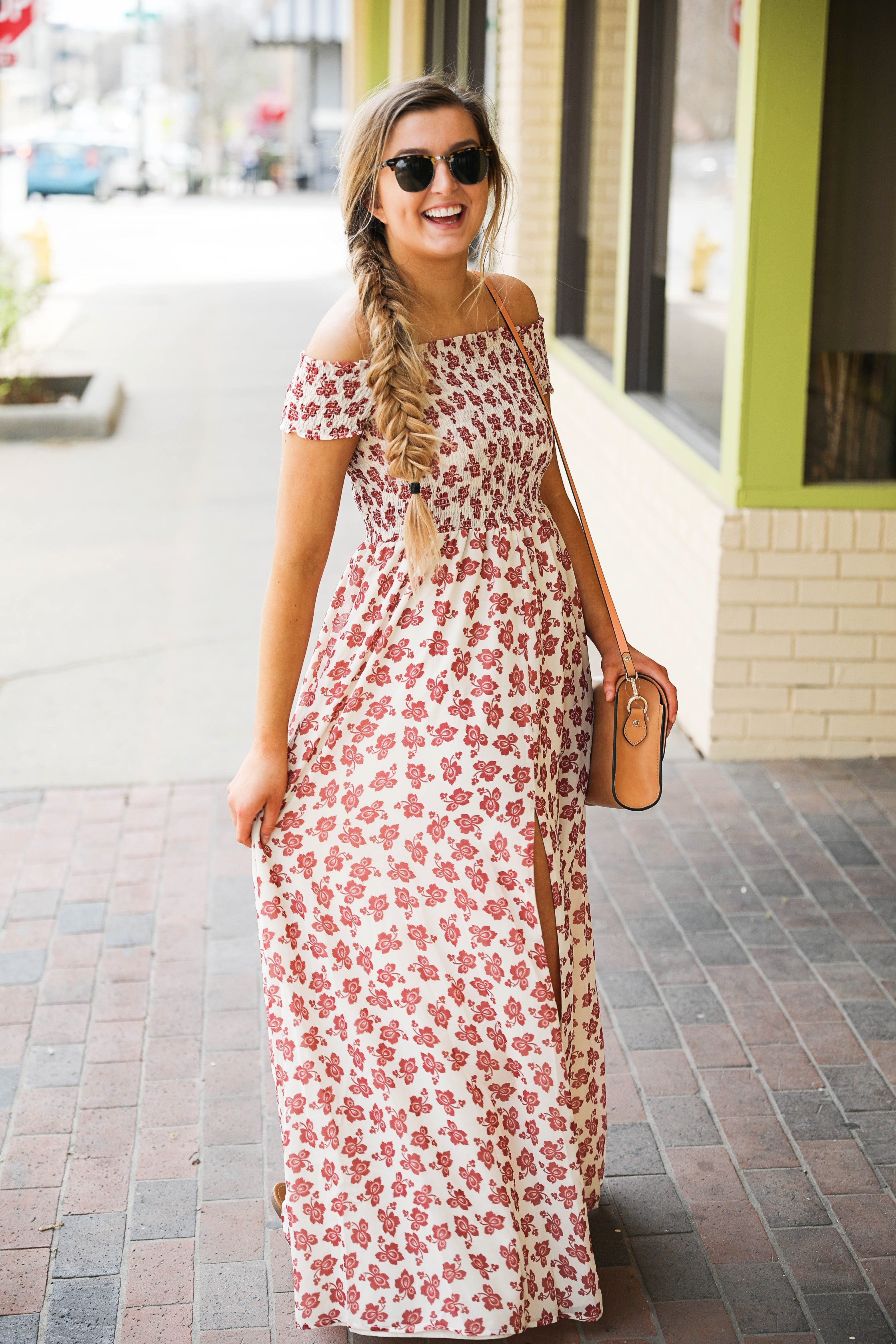 The prettiest floral off the shoulder dress for spring and summer! I am a sucker for a cute floral dress. I love the slit on the front of this dress and I paired it with a brown leather bag and sunglasses! By Lauren Lindmark on daily dose of charm dailydoseofcharm.com