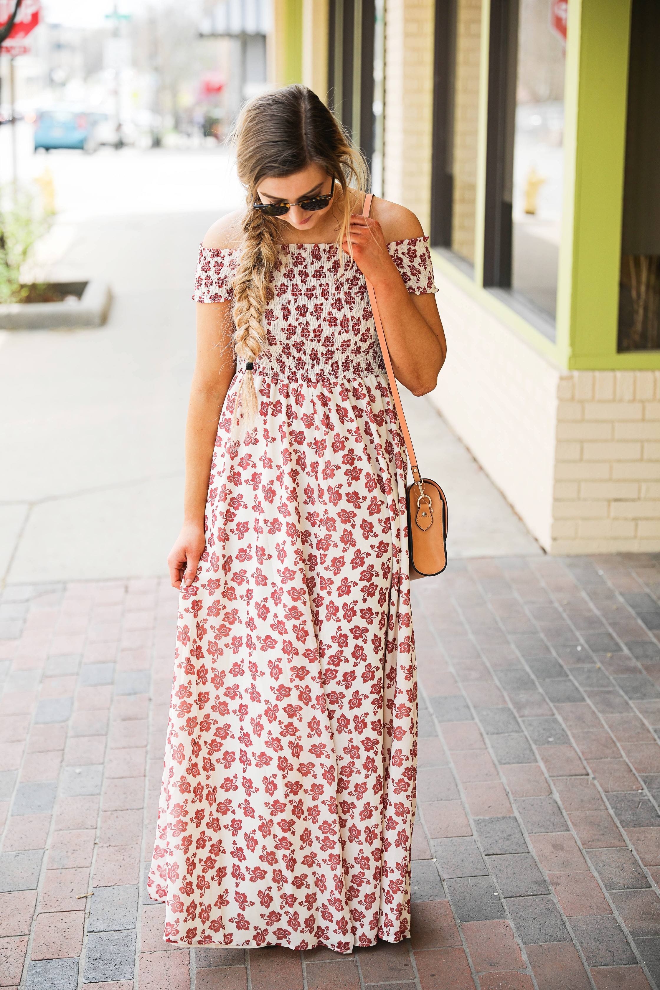 The prettiest floral off the shoulder dress for spring and summer! I am a sucker for a cute floral dress. I love the slit on the front of this dress and I paired it with a brown leather bag and sunglasses! By Lauren Lindmark on daily dose of charm dailydoseofcharm.com