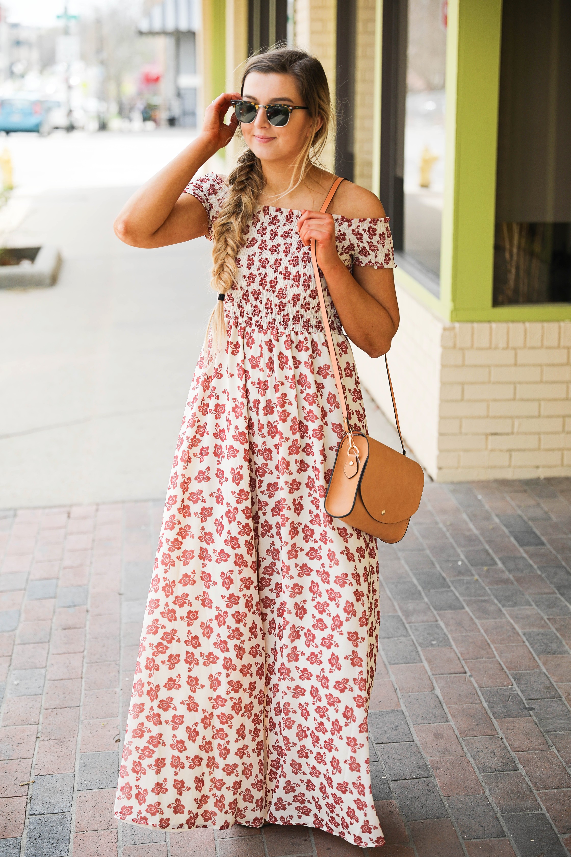 The prettiest floral off the shoulder dress for spring and summer! I am a sucker for a cute floral dress. I love the slit on the front of this dress and I paired it with a brown leather bag and sunglasses! By Lauren Lindmark on daily dose of charm dailydoseofcharm.com