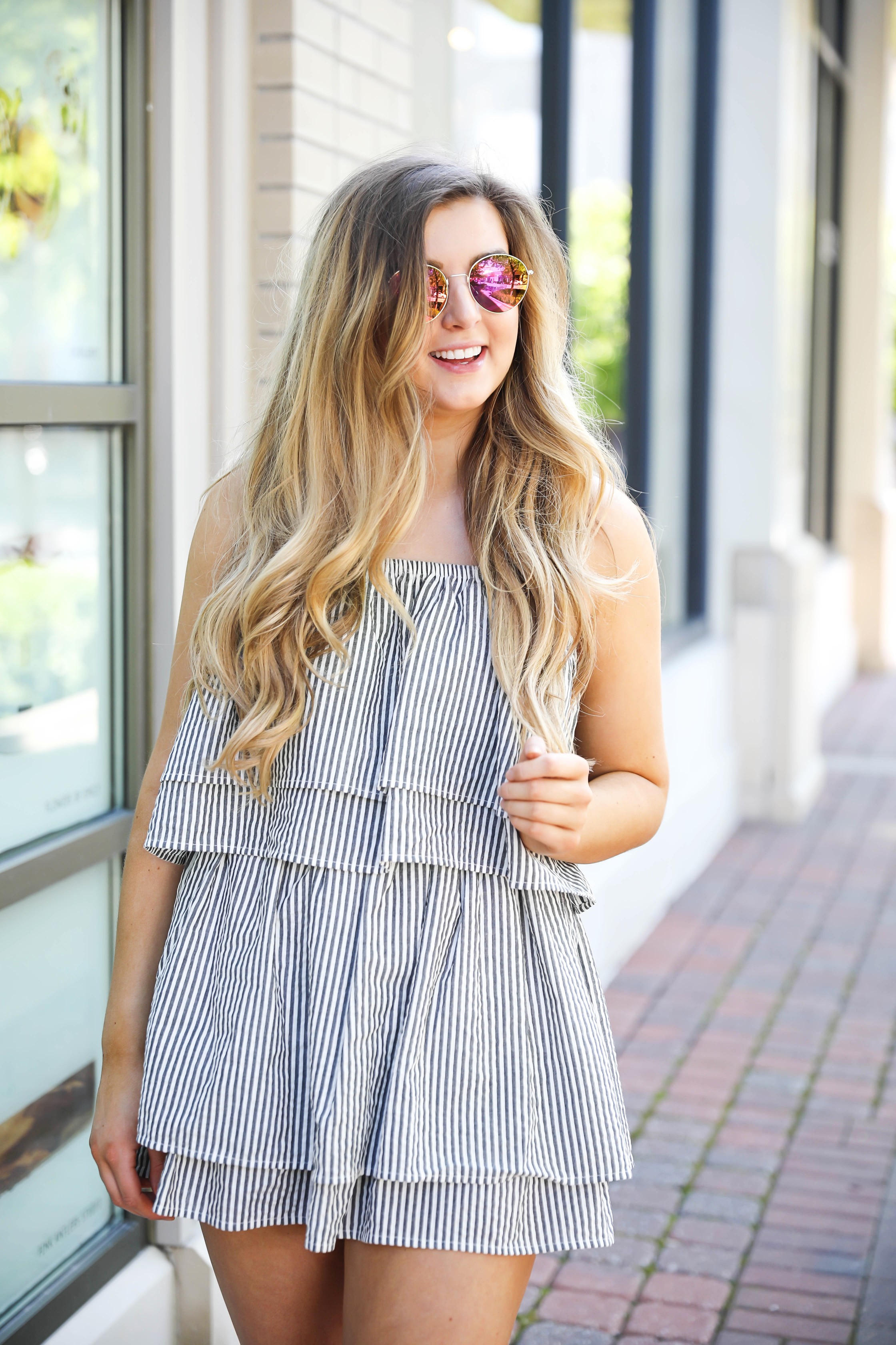 Striped ruffle dress with circle sunglasses and brown leather sandals! By Lauren Lindmark on dailydoseofcharm.com fashion blog daily dose of charm